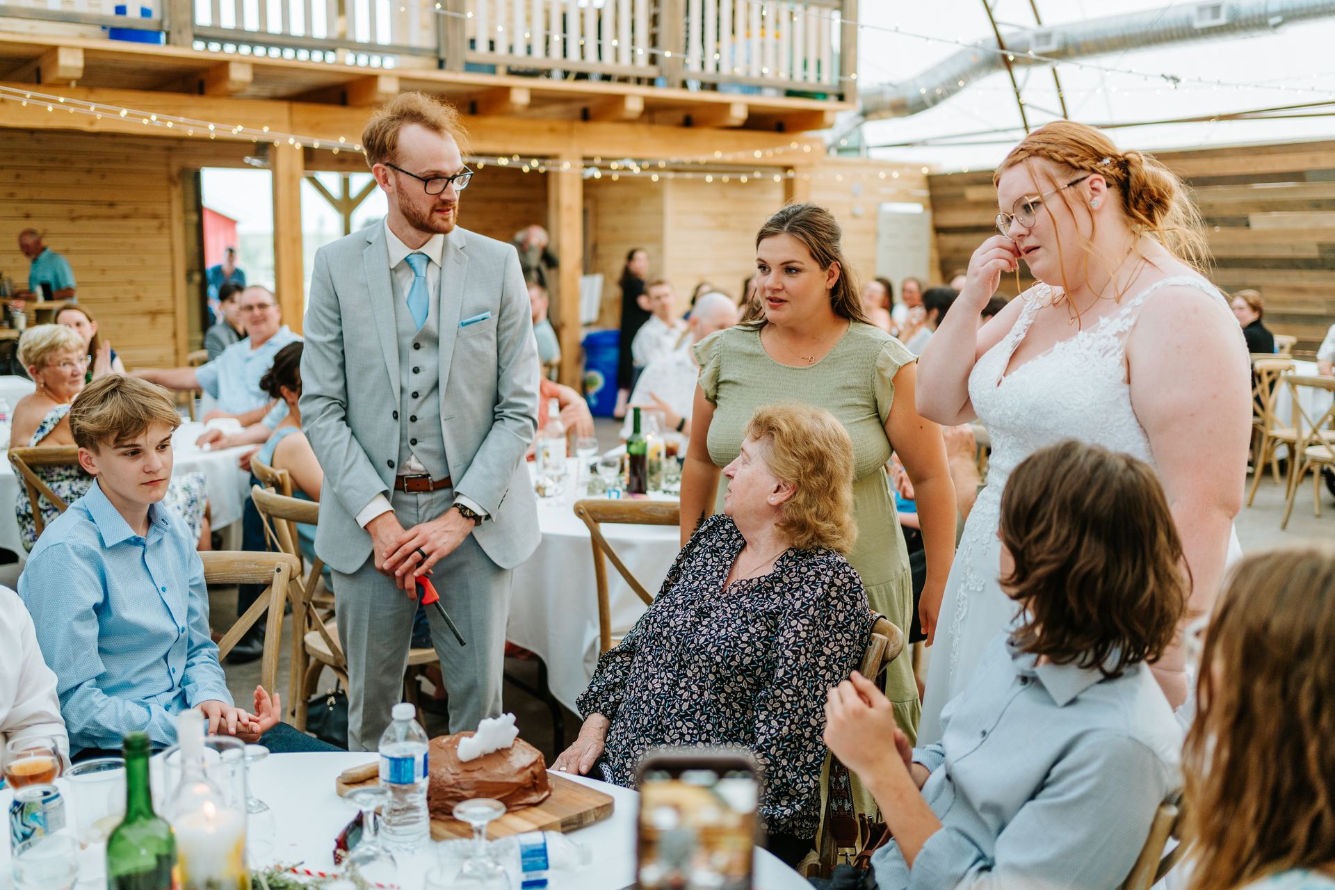 Alysia and Josh sharing an emotional moment during the reception at Deer Meadow Farm Manitoba wedding