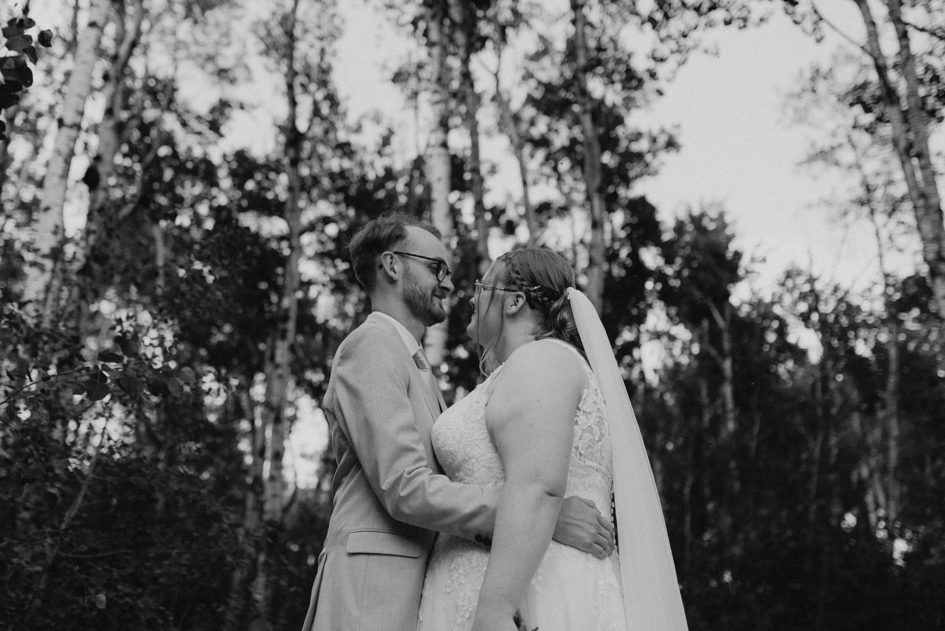 Black and white couple portrait in birch forest — Deer Meadow Farm Manitoba wedding photography by Chris Ngo