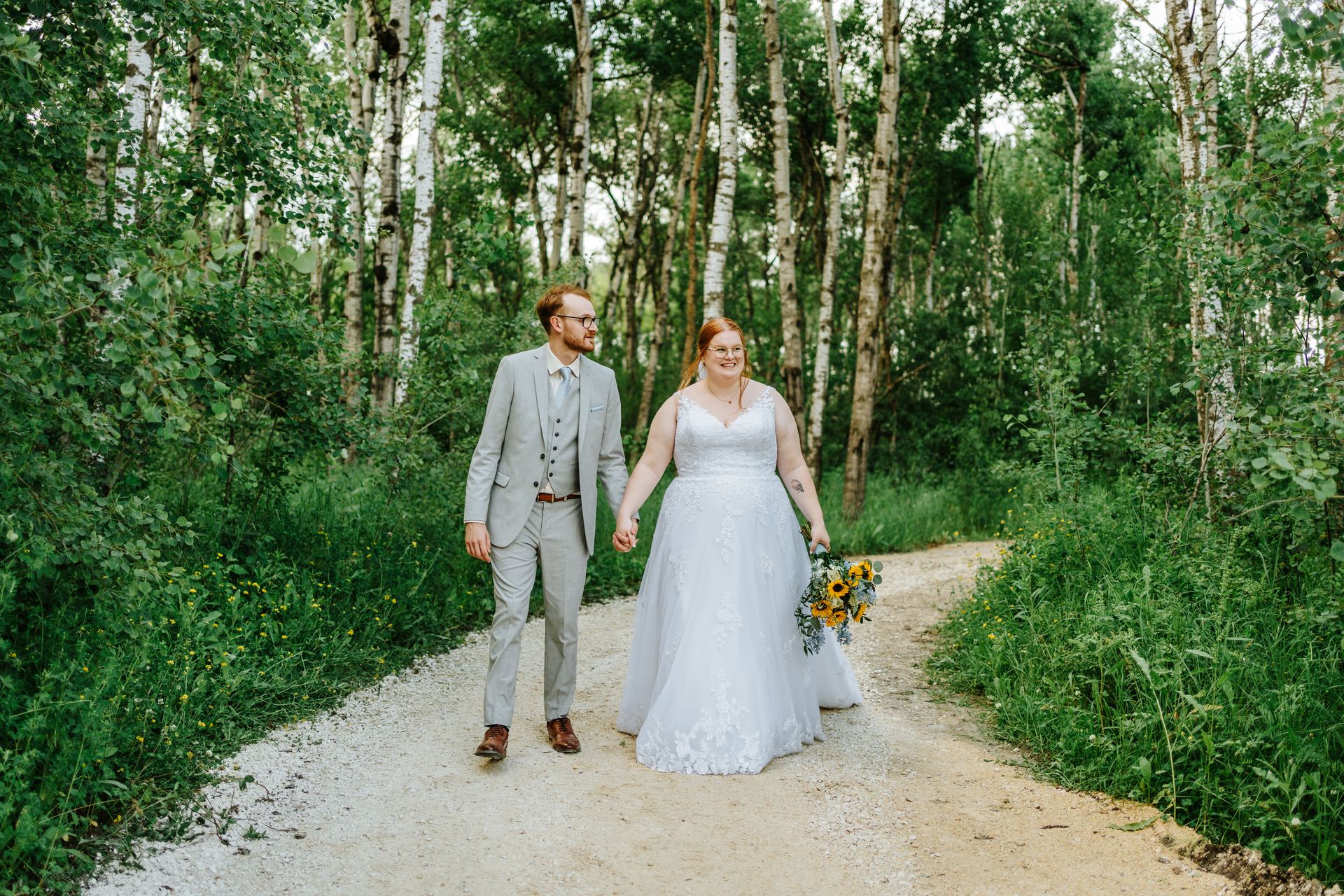 Alysia and Josh romantic portrait in the birch trees in summer light at Deer Meadow Farm — Manitoba wedding photographer