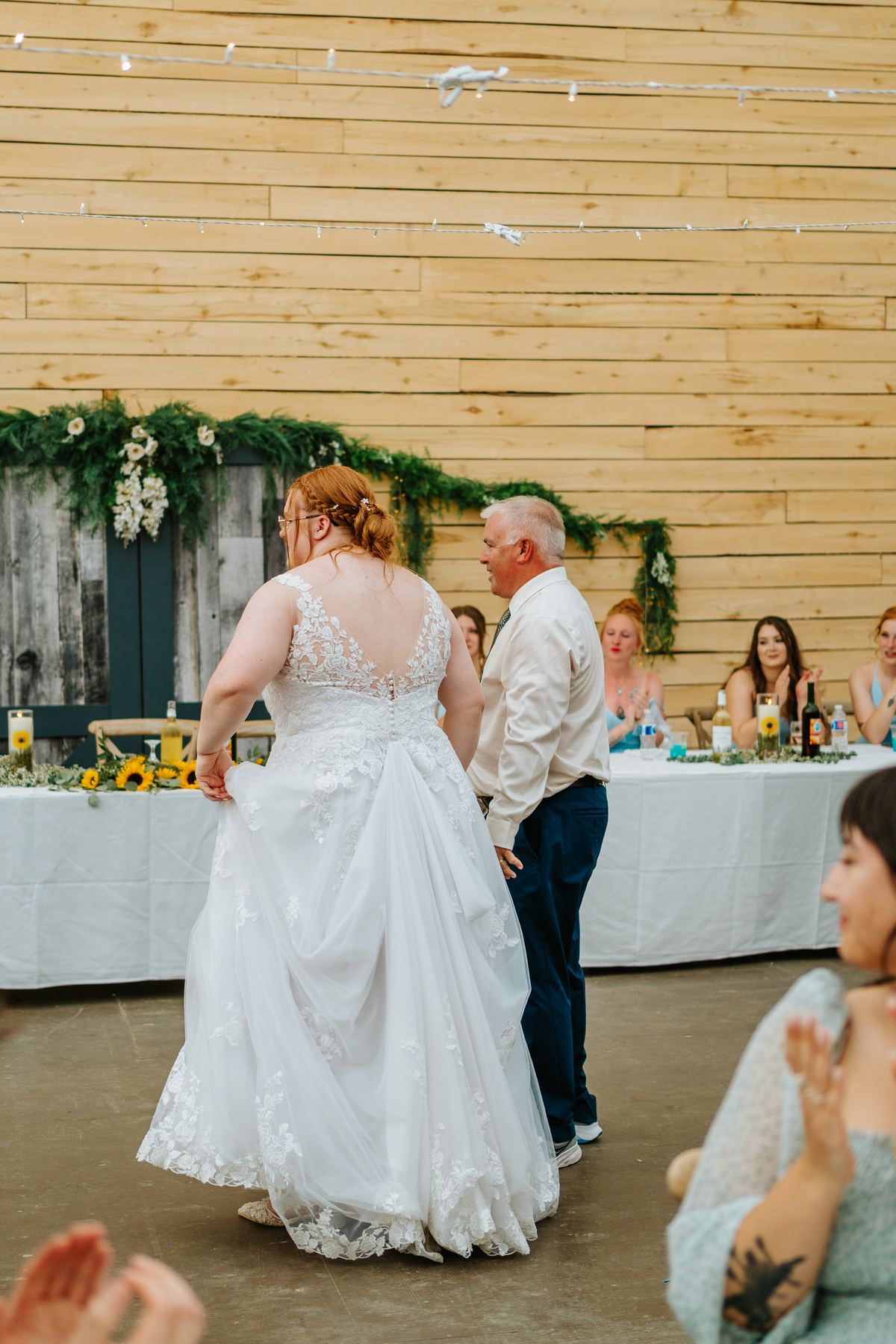 Father-daughter dance in the quonset barn at Deer Meadow Farm Manitoba — wedding photography by Chris Ngo