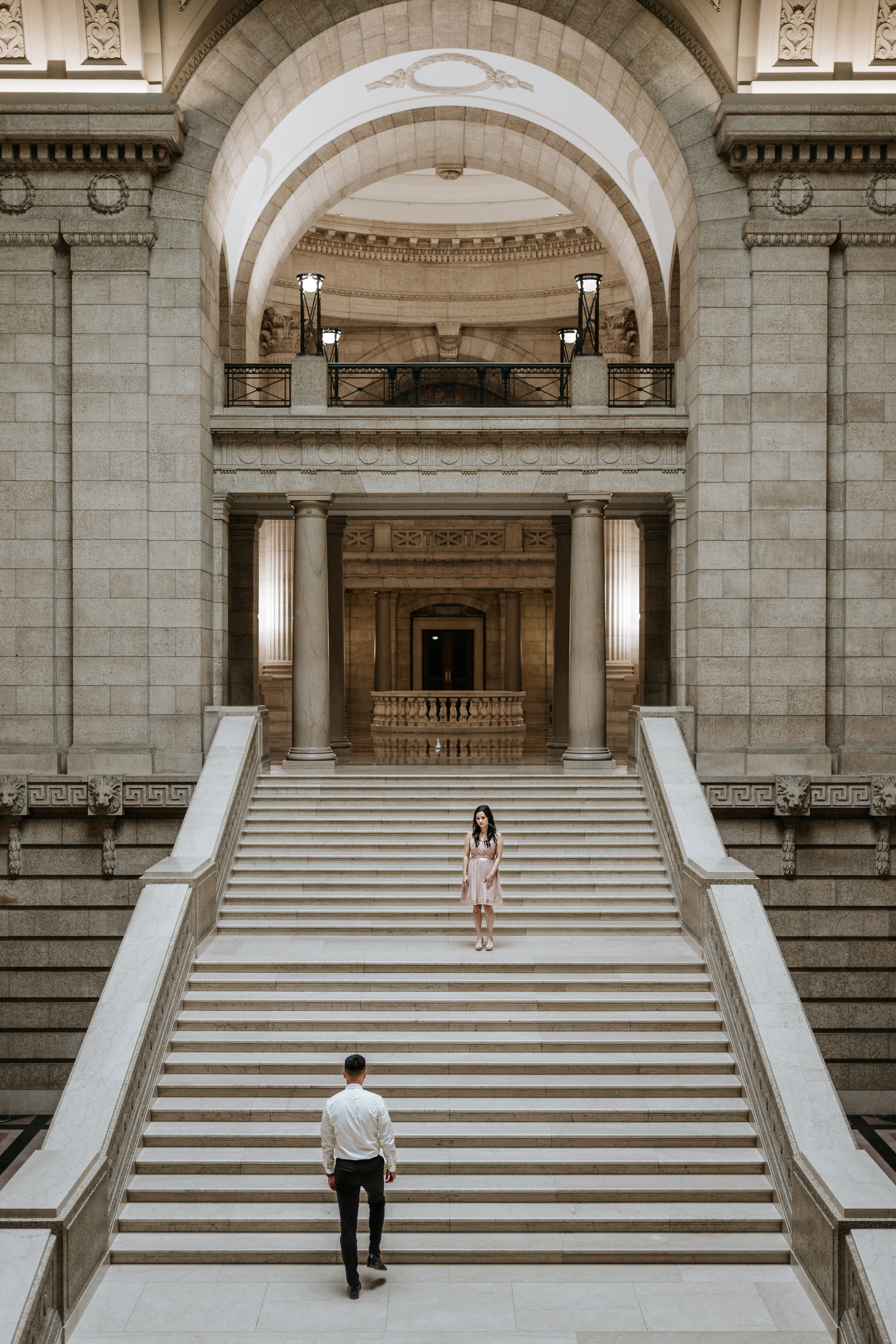 AJ and Julie engagement session on the grand staircase of the Manitoba Legislative Building — Ngo Photography Winnipeg