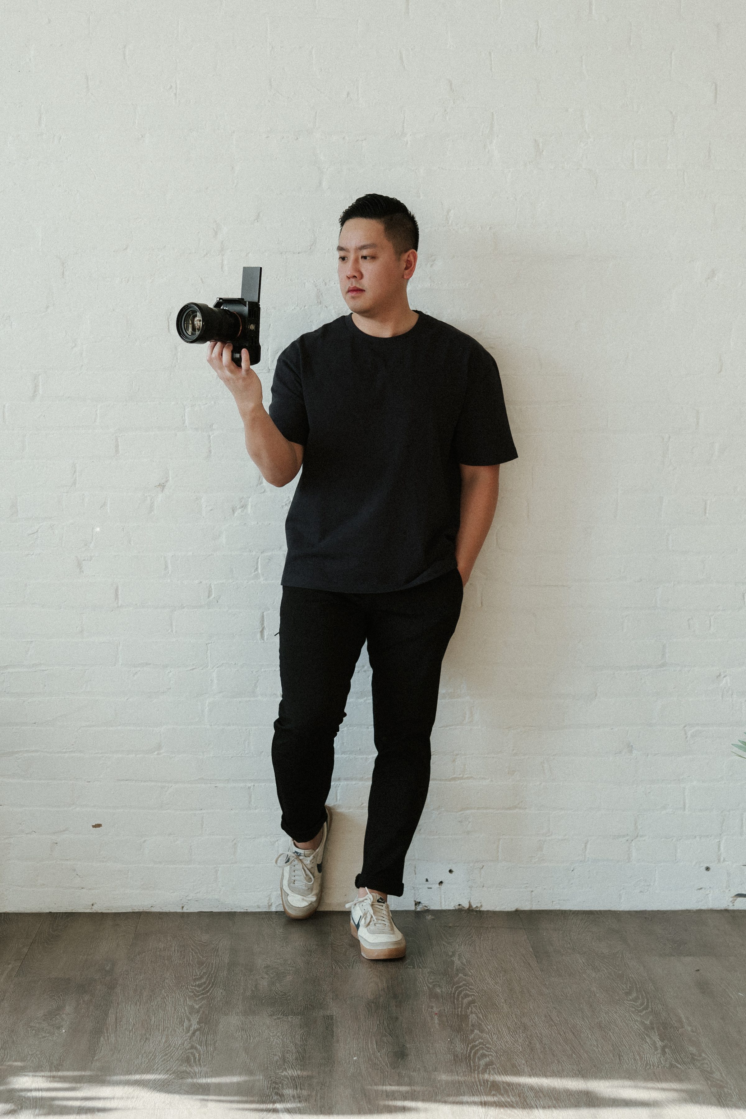 Chris Ngo with camera