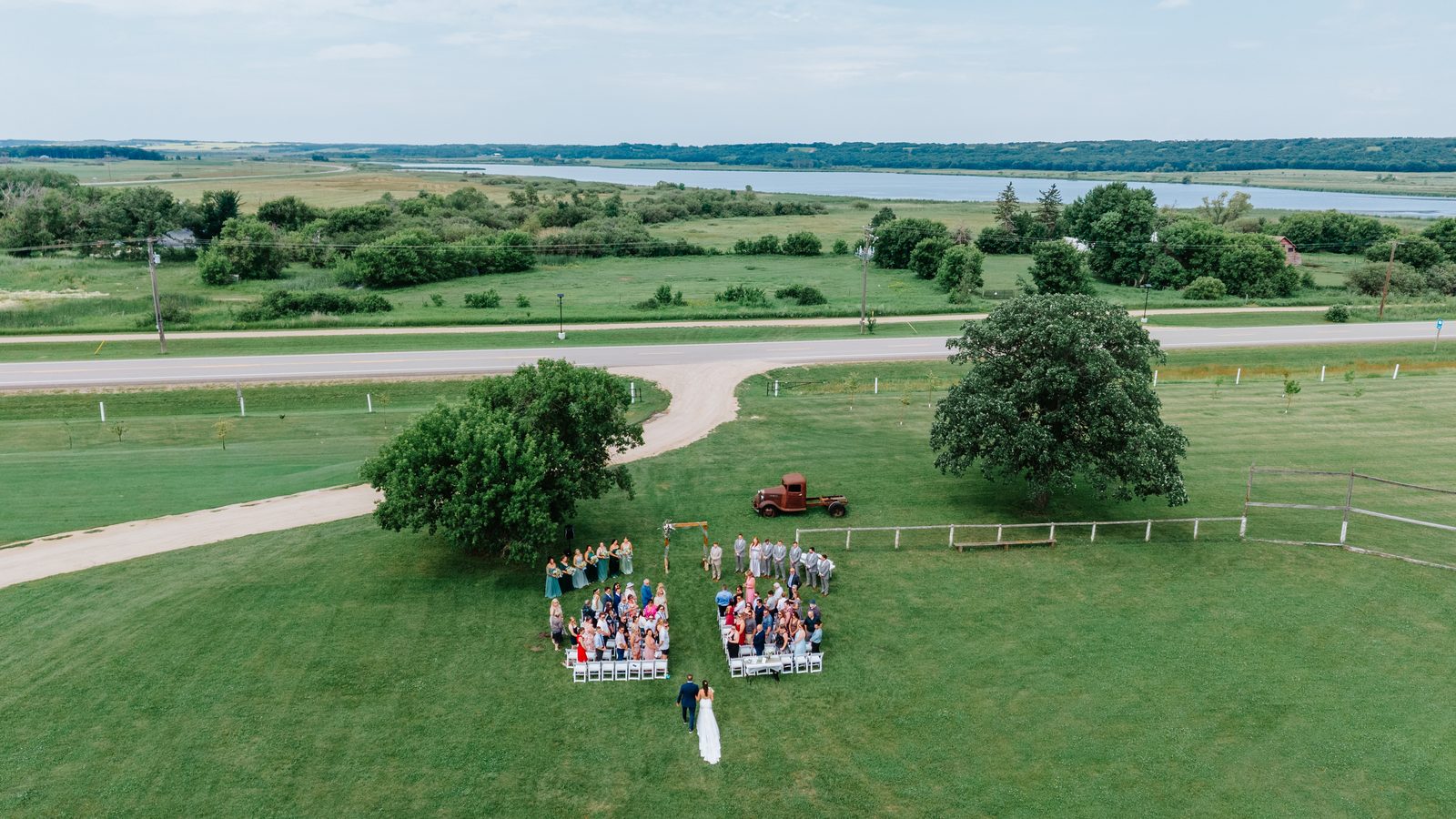 Aerial drone view of the ceremony setup at Pelican Yacht Club — Pelican Lake, Ninette, Manitoba