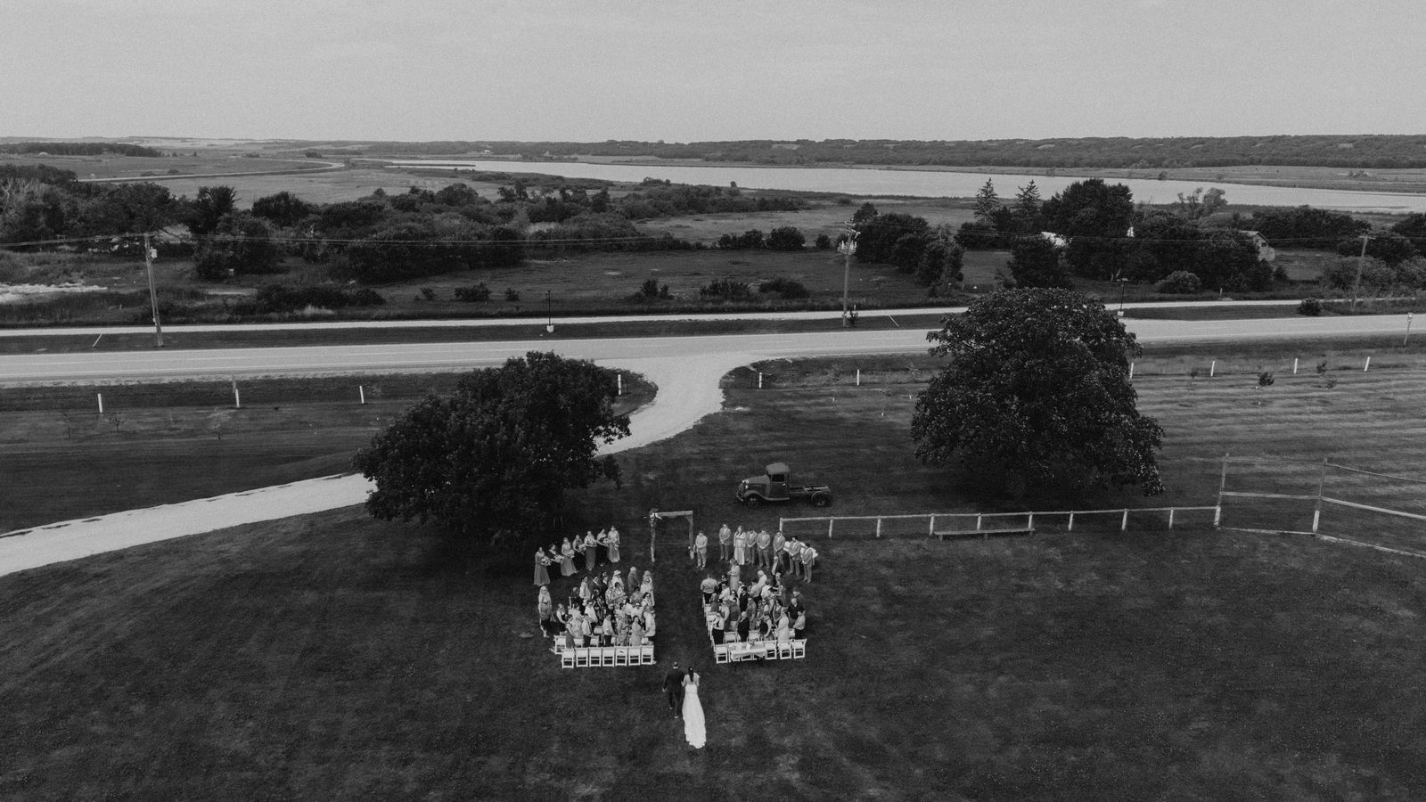 Aerial overview of the Pelican Yacht Club ceremony grounds and surrounding lake — Ninette, Manitoba