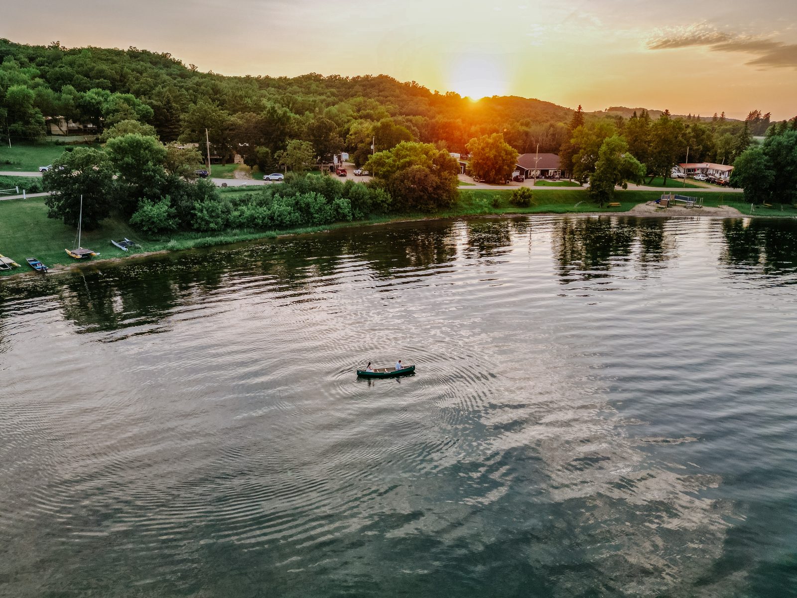 Aerial drone over Pelican Lake at dusk — Ninette, Manitoba