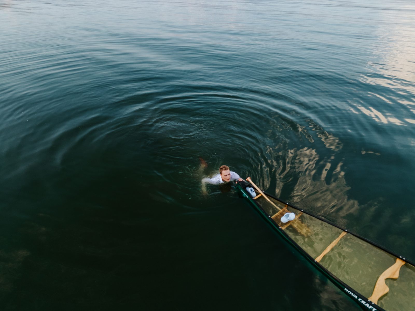 Aerial drone of Jack swimming in Pelican Lake — Ninette, Manitoba