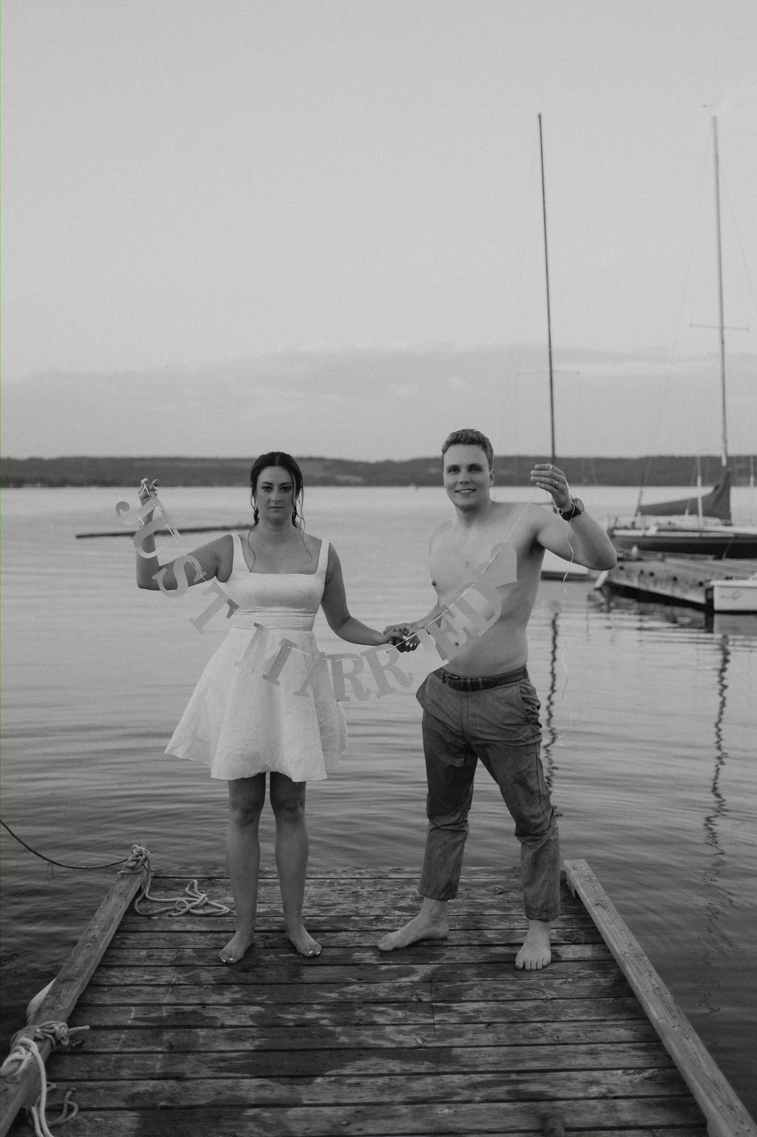 JUST MARRIED sign on the Pelican Yacht Club marina dock — black and white — Ninette, Manitoba
