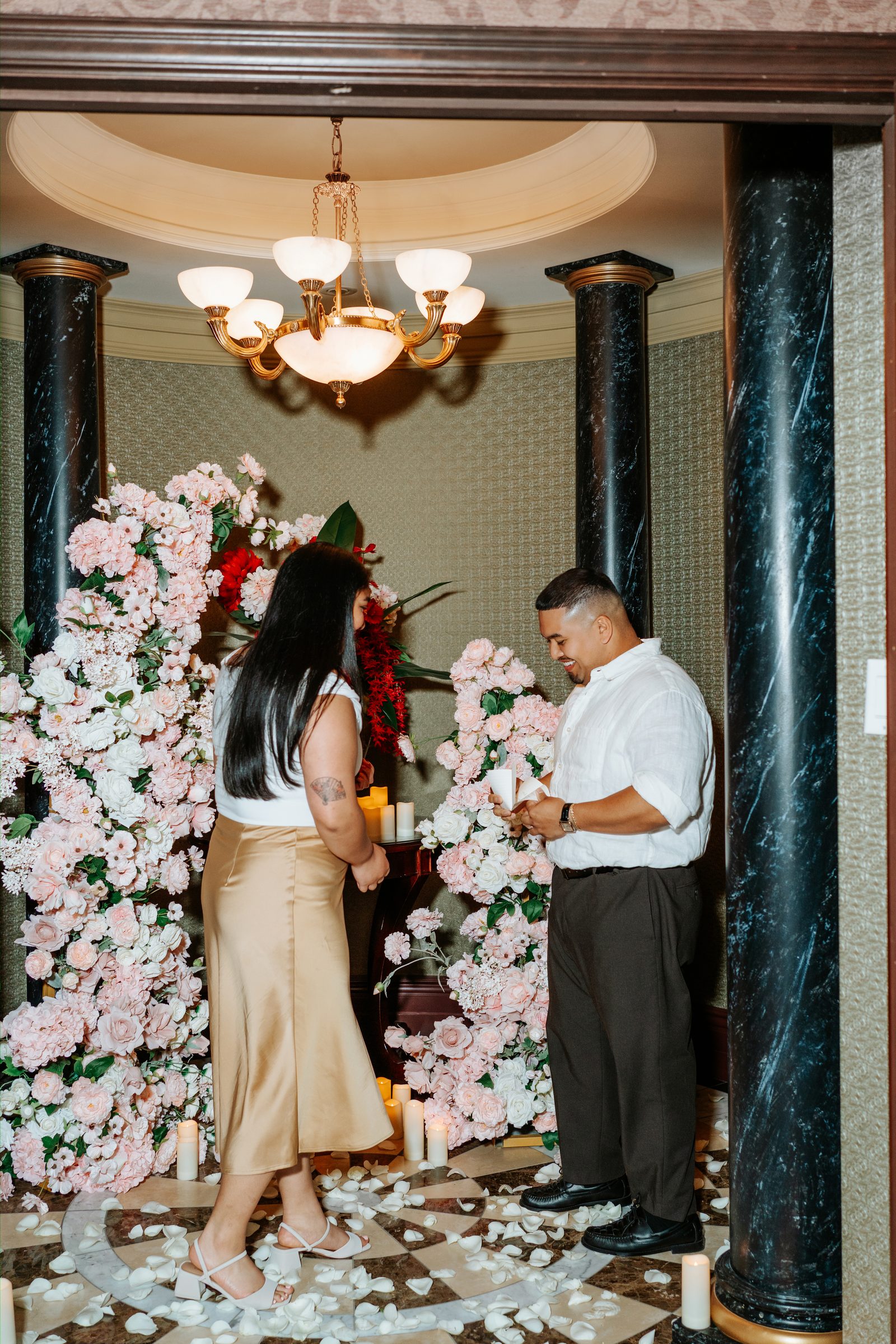Deril and Annie close portrait at the floral arch — proposal moment photography in downtown Winnipeg by Chris Ngo Ngo Photography
