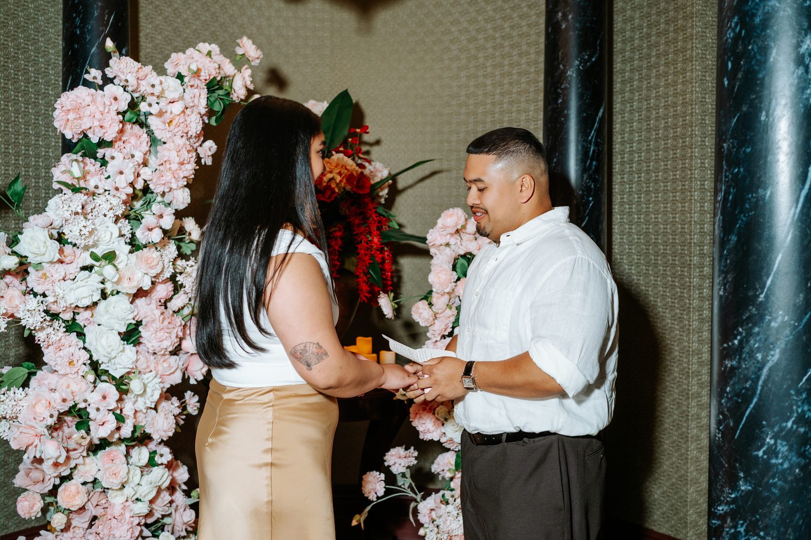 Annie and Deril laughing together in the first moments after the proposal — downtown Winnipeg proposal photographer Chris Ngo Ngo Photography