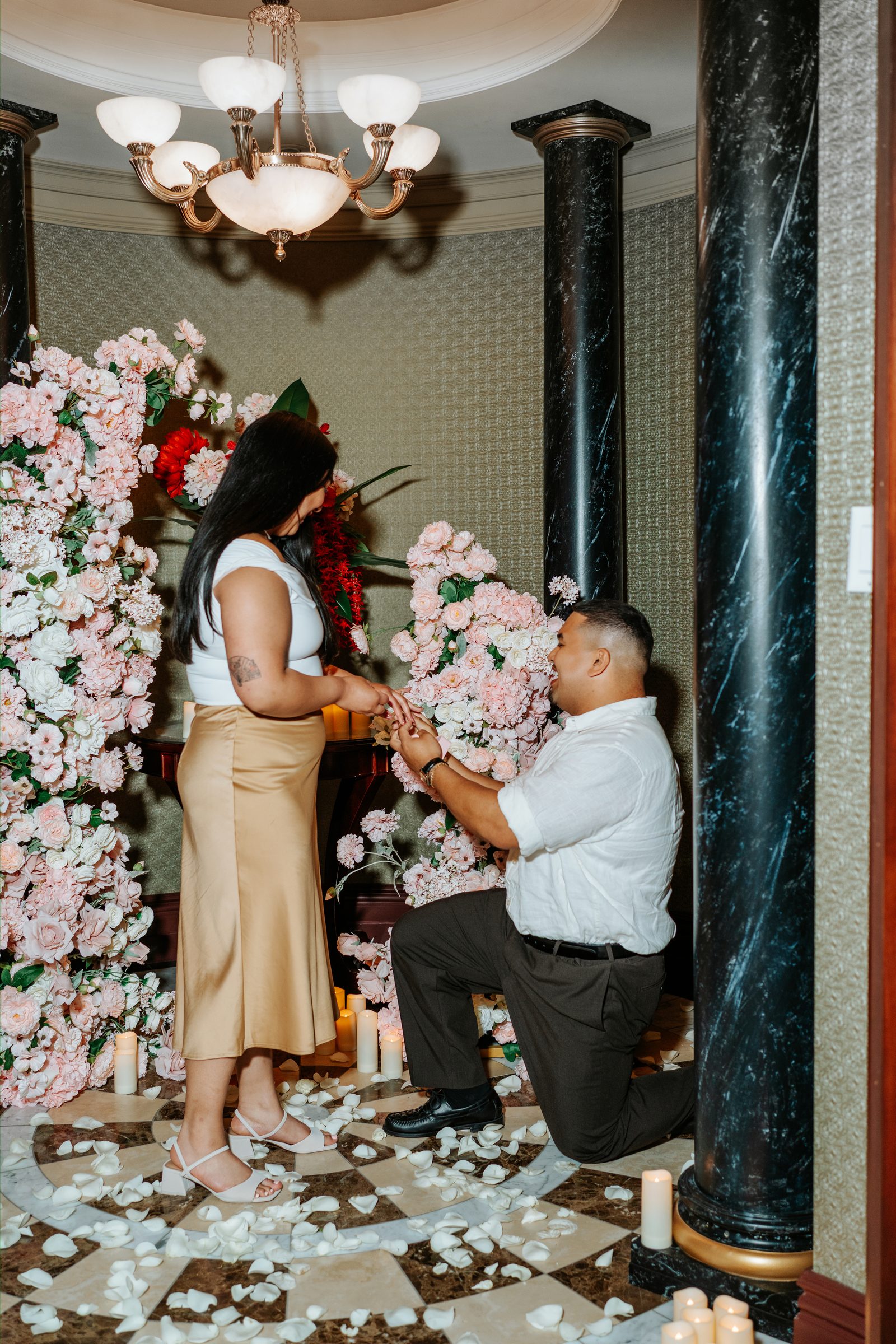 Annie and Deril close portrait after the surprise proposal in downtown Winnipeg — Ngo Photography