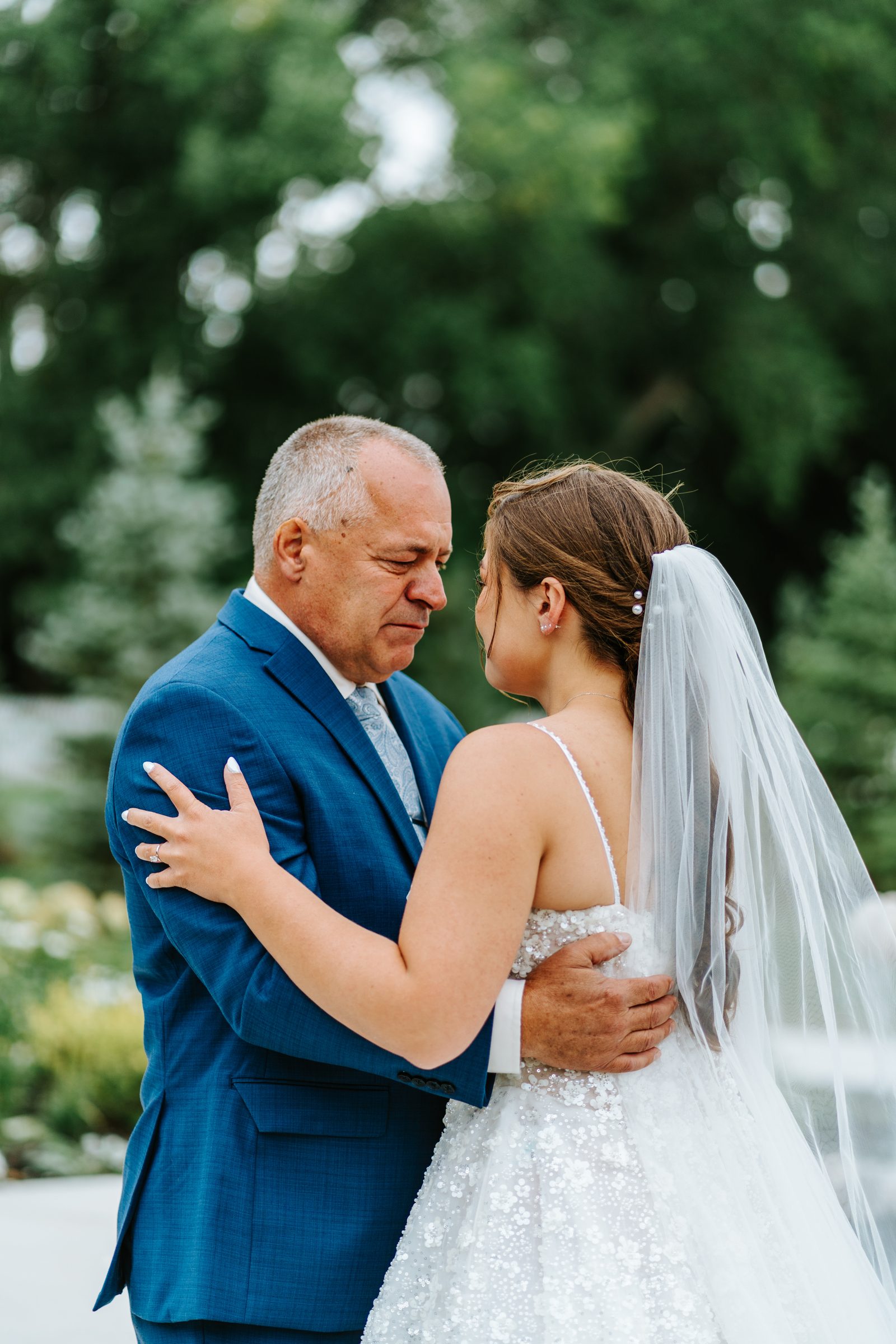 Erin's father seeing her for the first time on her wedding day at Buttercup Café — emotional father-daughter first look, Ngo Photography Winnipeg