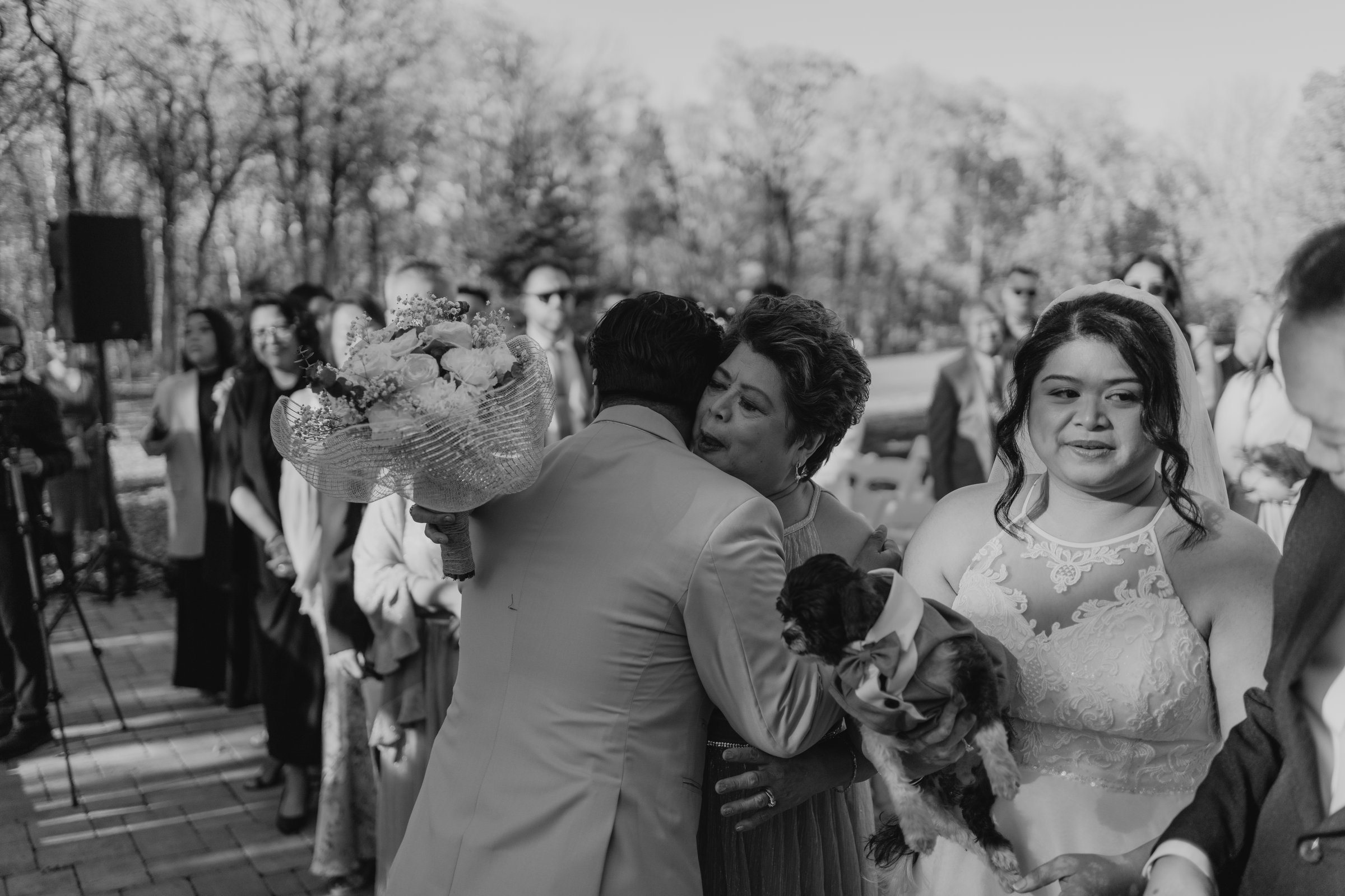 Ceremony celebration at Bel Acres after Gin and Marieanne are pronounced married — wedding photography by Chris Ngo
