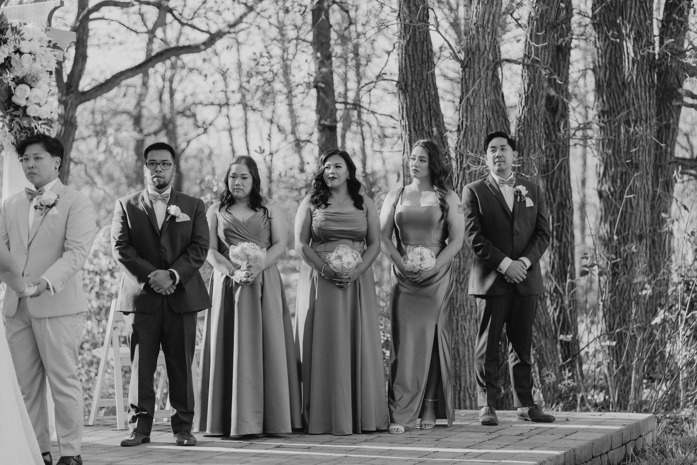 Gin and Marieanne celebrate with their guests after the ceremony at Bel Acres — fall wedding photography by Ngo Photography Winnipeg