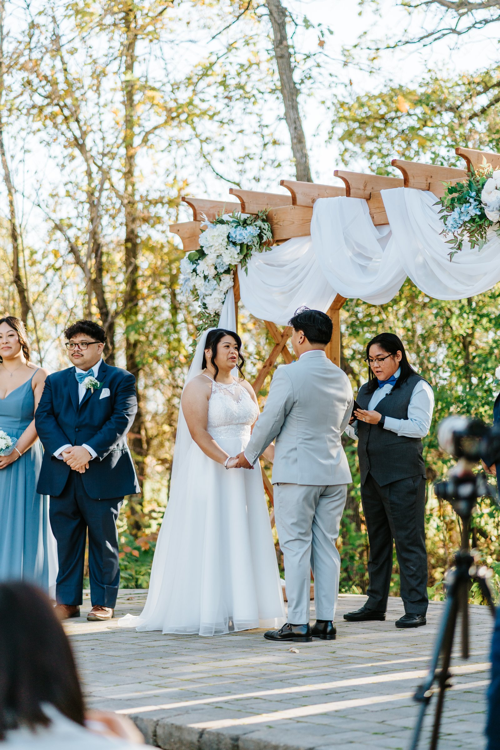 Guests celebrate after the ceremony at Bel Acres Golf and Country Club — Gin and Marieanne wedding by Chris Ngo