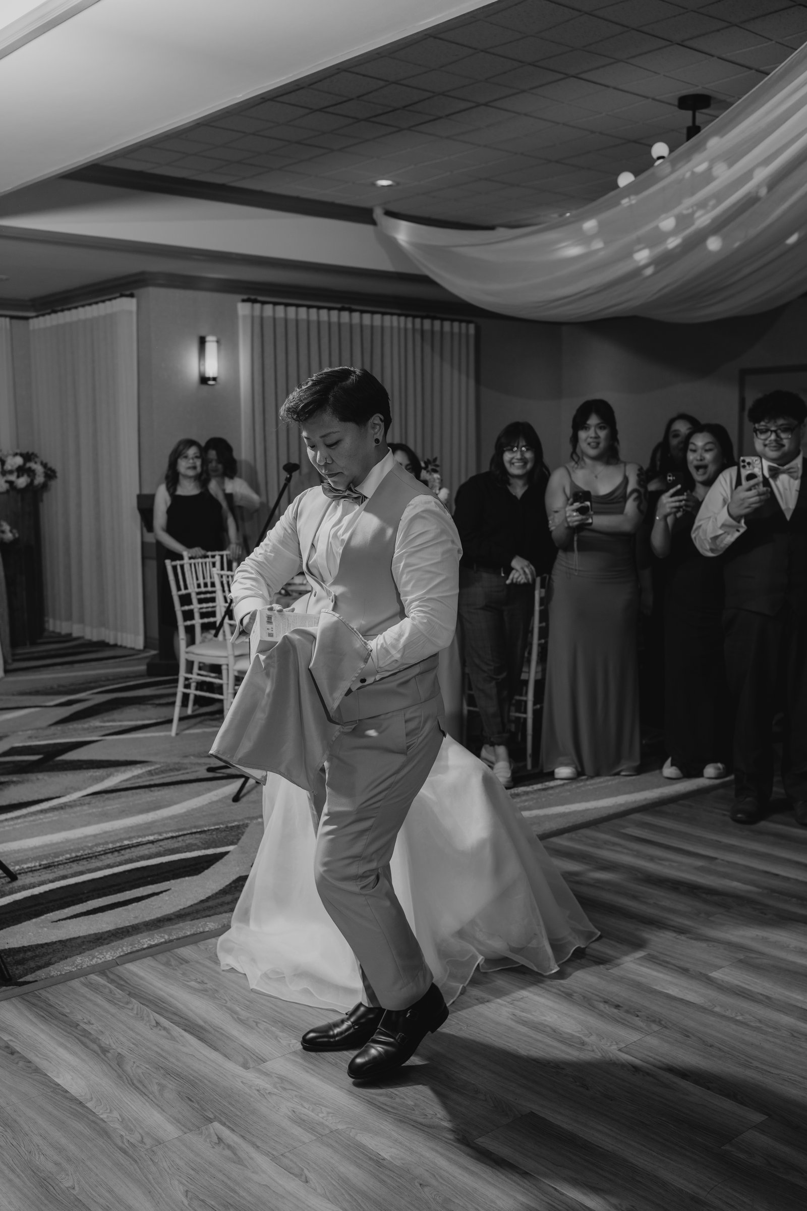 Gin and Marieanne celebrate on the dance floor at Bel Acres — fall wedding photography by Ngo Photography, October 2025
