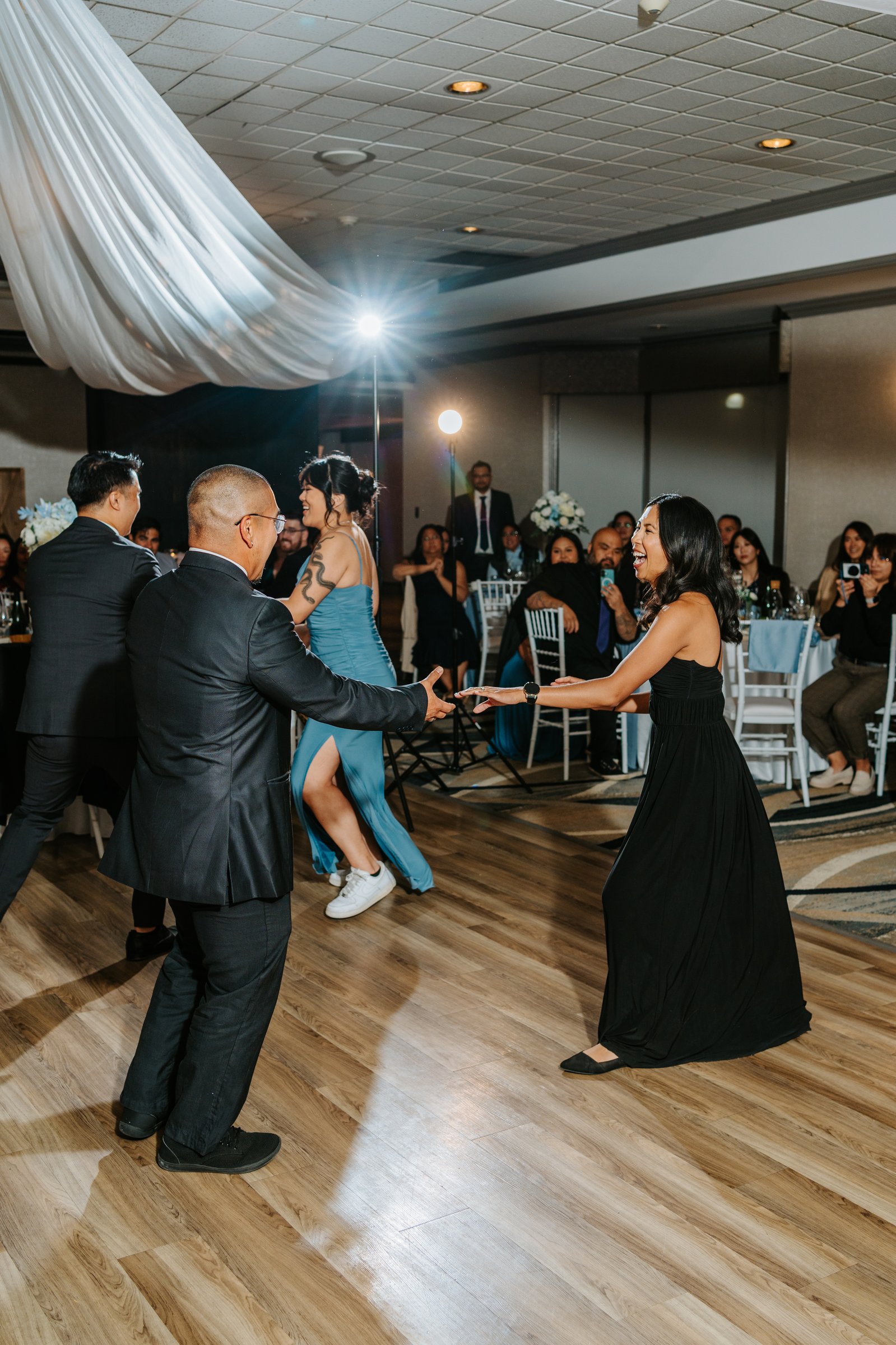 Evening dancing and celebration at Bel Acres Diner Hall — Gin Centina and Marieanne Merene wedding by Chris Ngo