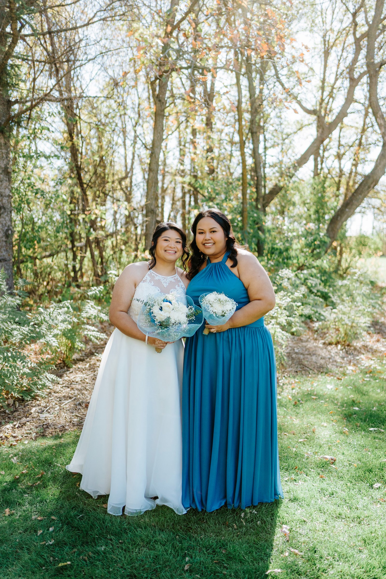 Gin and Marieanne with their wedding party on the Bel Acres Golf and Country Club fairways — wedding photography by Chris Ngo, Ngo Photography