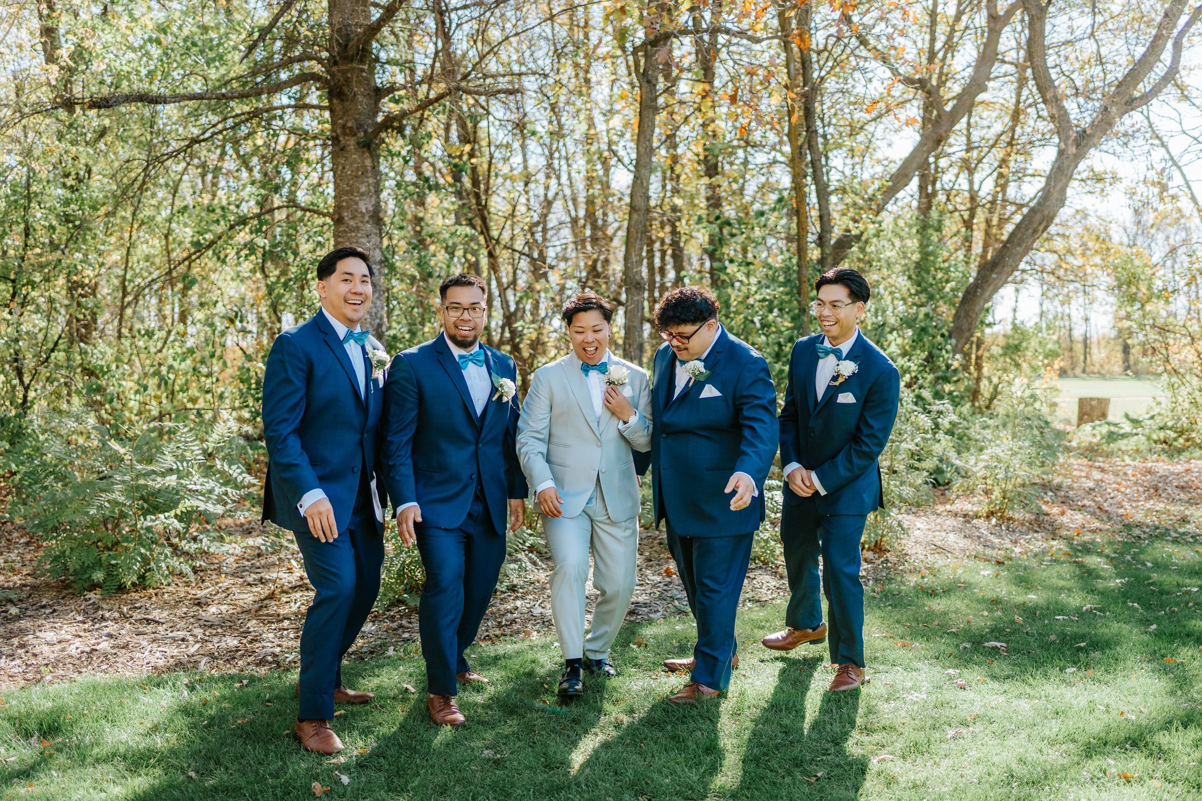 Gin and Marieanne with their families during formal portraits at Bel Acres — wedding photography by Ngo Photography