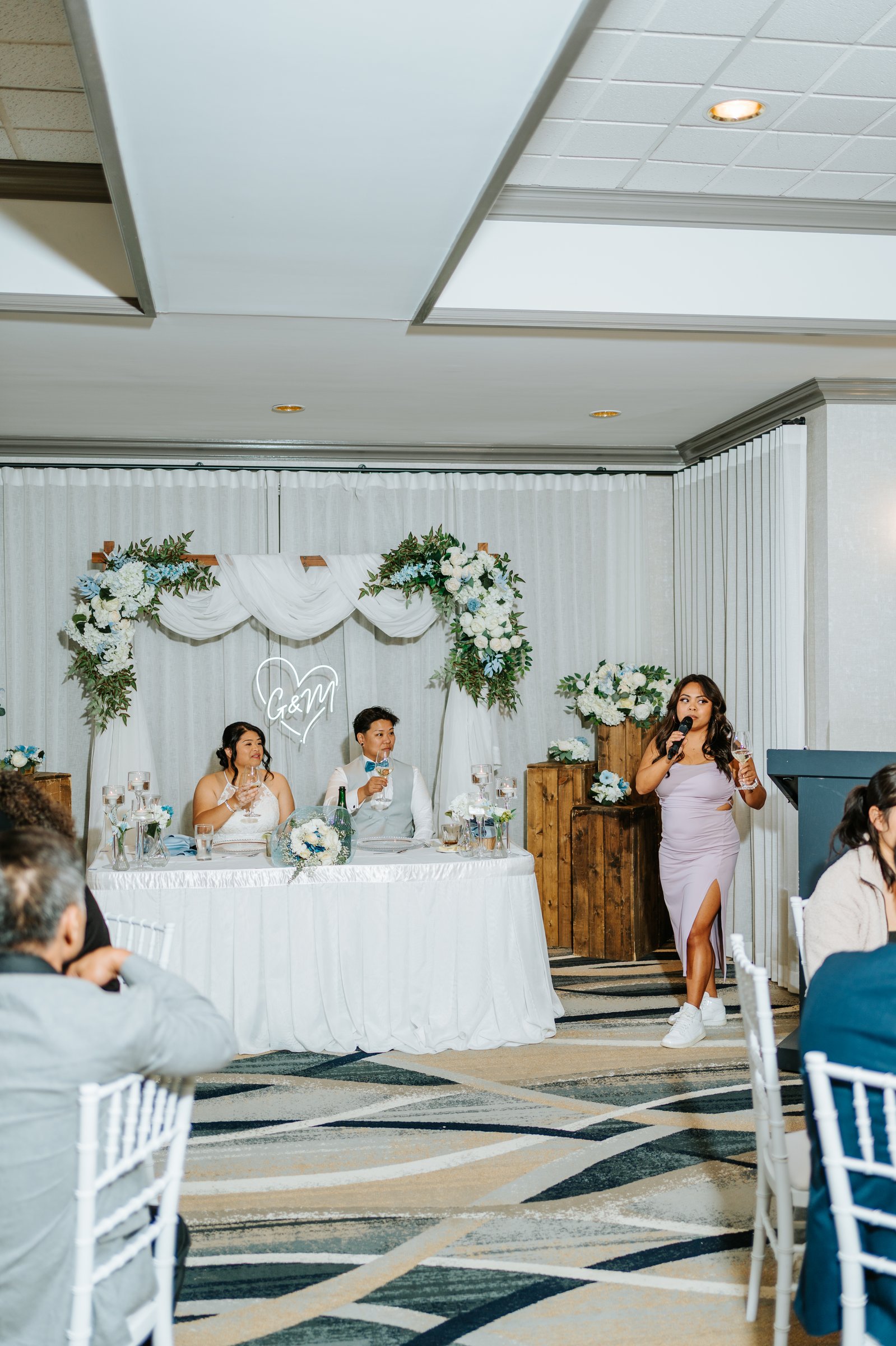 Gin and Marieanne silhouette on the Bel Acres fairway at golden hour — fall wedding photography by Ngo Photography Winnipeg