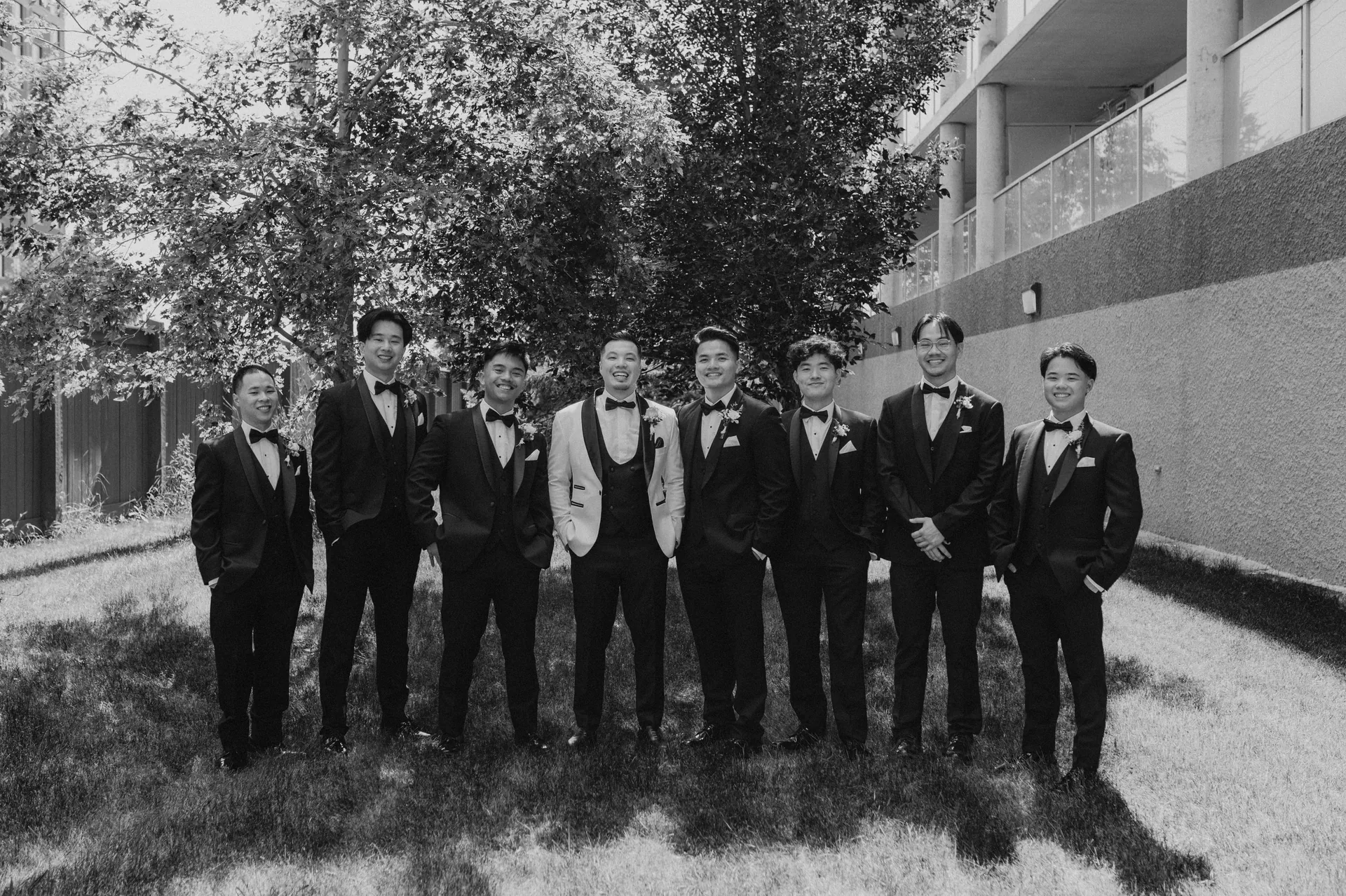 Wide shot of outdoor ceremony at Bridges Golf Course in black and white, Winnipeg