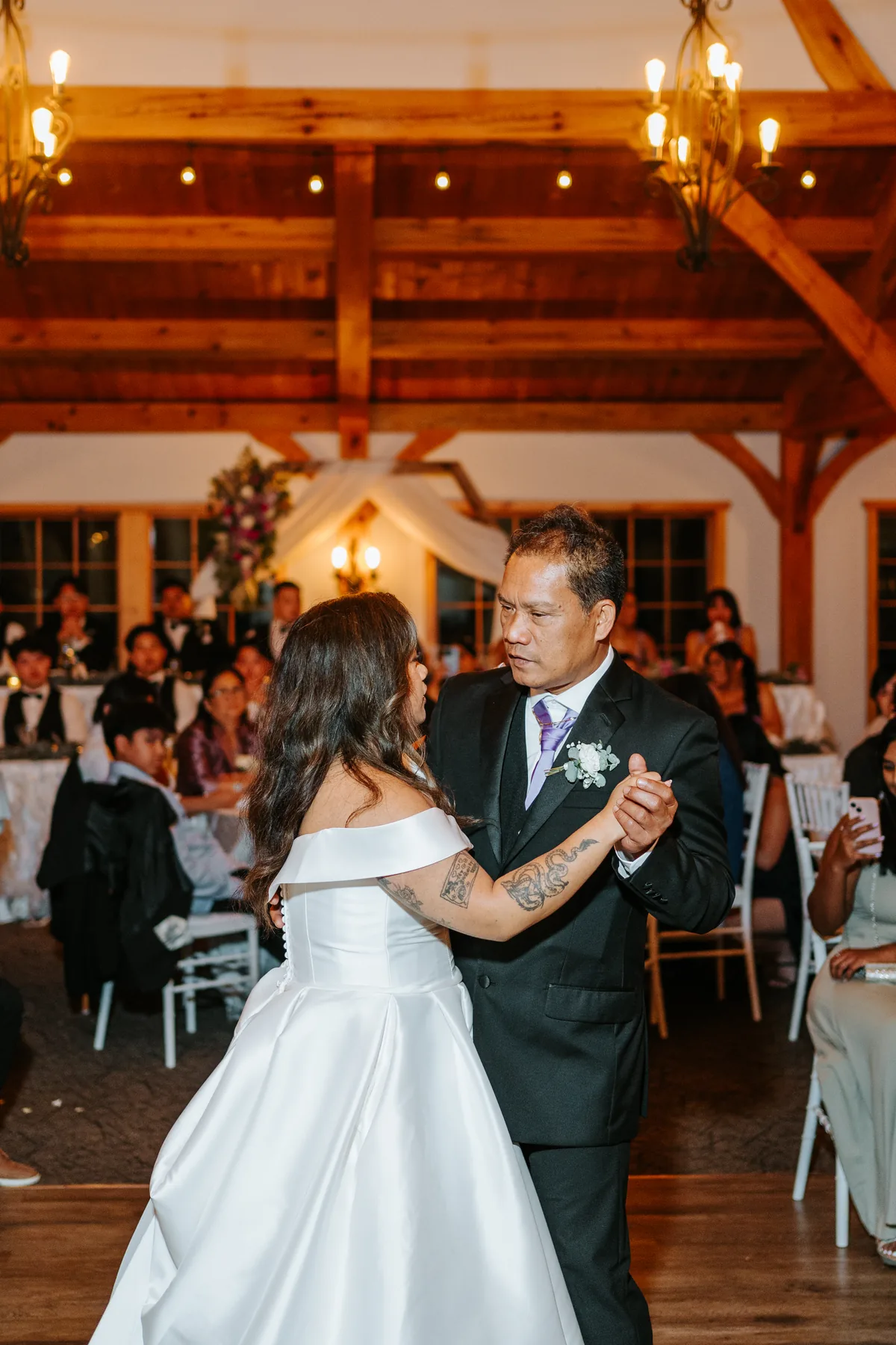 Couple first dance portrait at Bridges Golf Course reception, Winnipeg