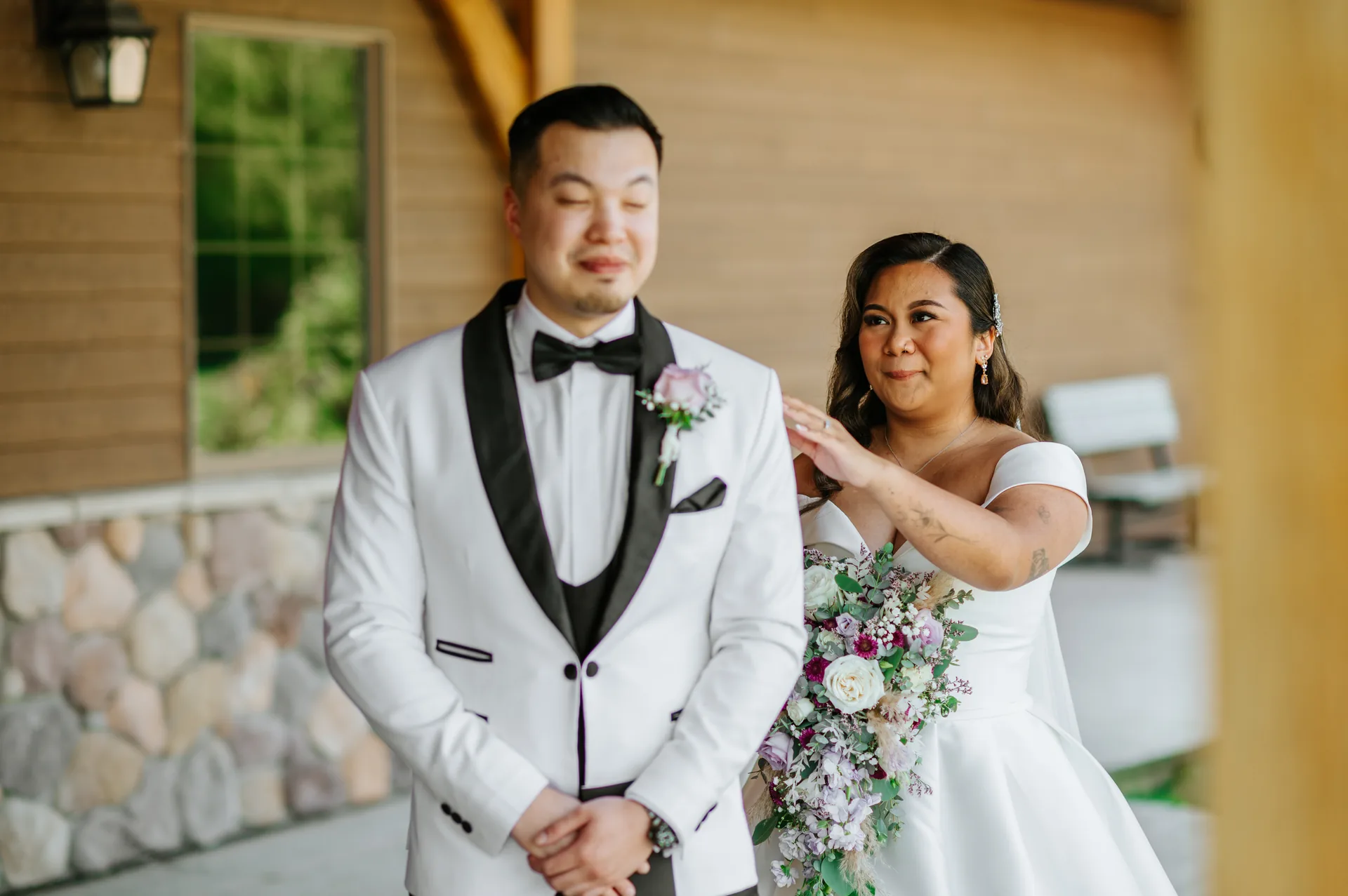 First kiss as a married couple at Bridges Golf Course outdoor ceremony, Winnipeg
