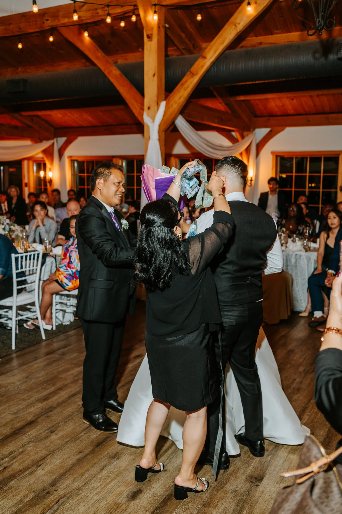 Dance floor energy at Bridges Golf Course wedding reception, Winnipeg