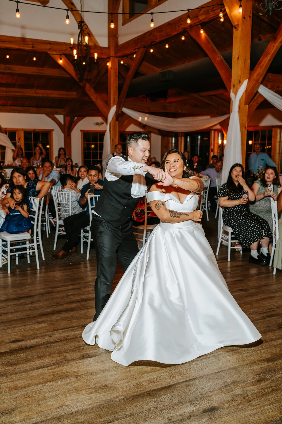 Wedding guests dancing at Bridges Golf Course reception, Winnipeg