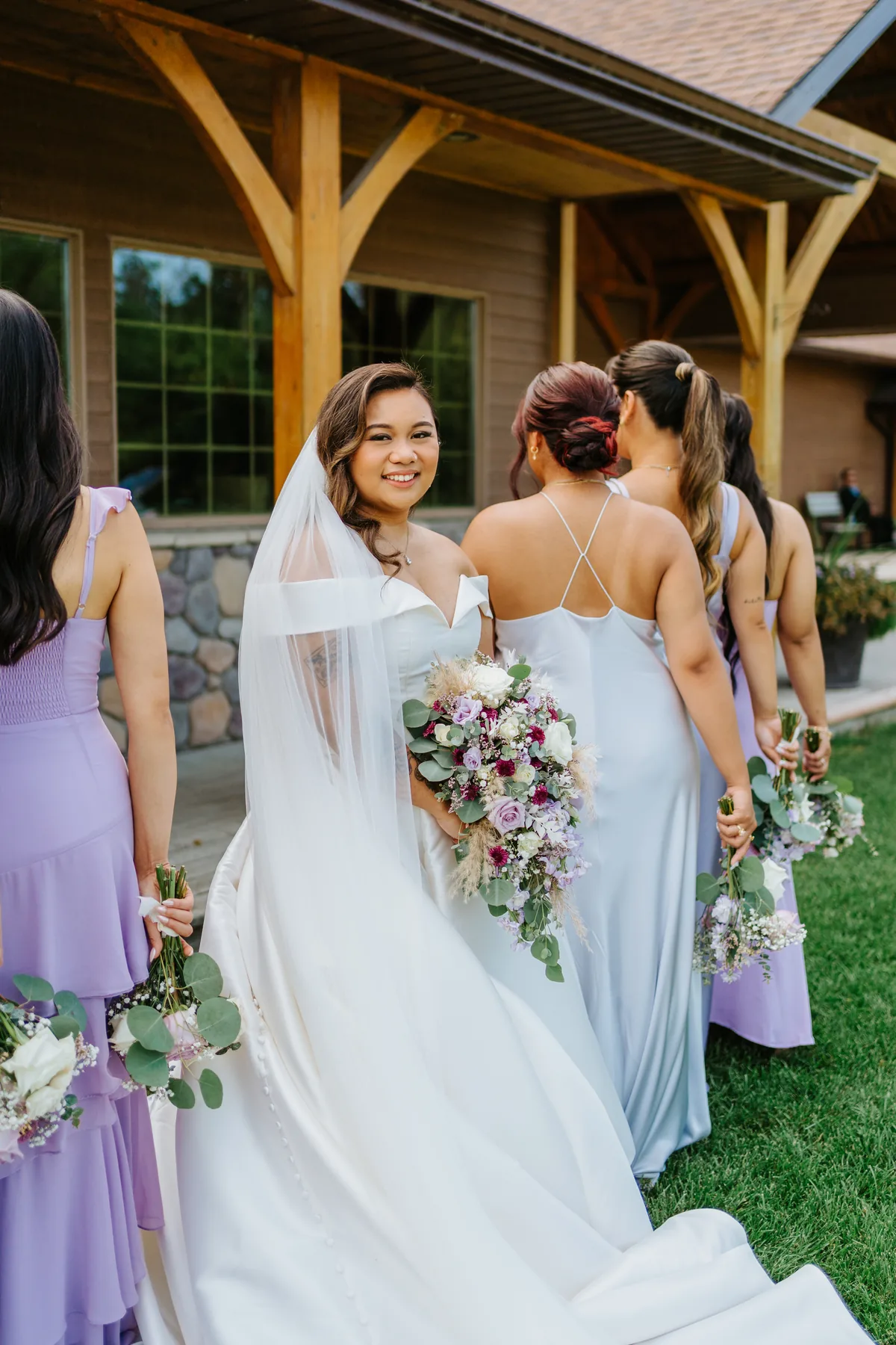 Wedding party among the trees and greenery at Bridges Golf Course, Winnipeg