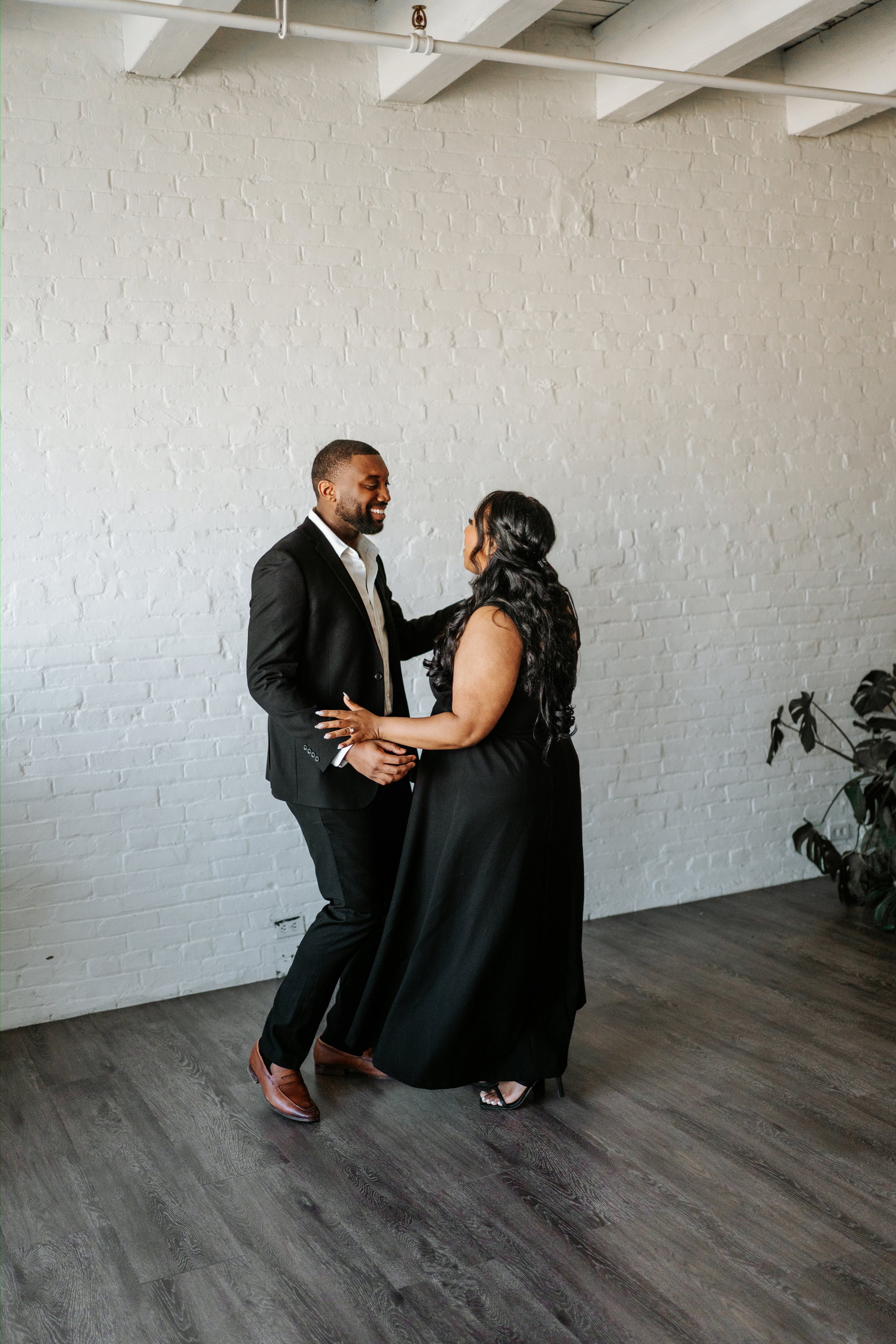 Jaida and Jordan portrait on the streets of downtown Winnipeg — engagement photography Ngo Photography
