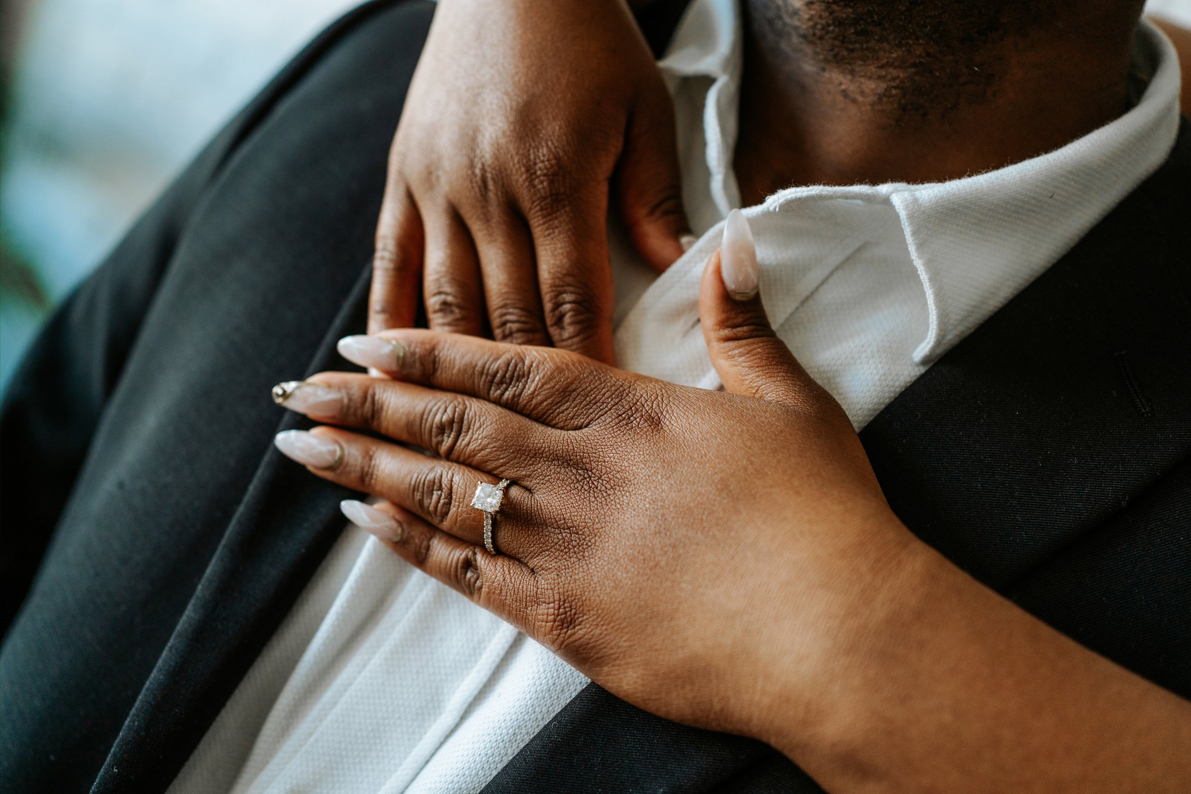 Wide studio portrait of Jaida and Jordan with soft directional light — engagement photography by Chris Ngo downtown Winnipeg