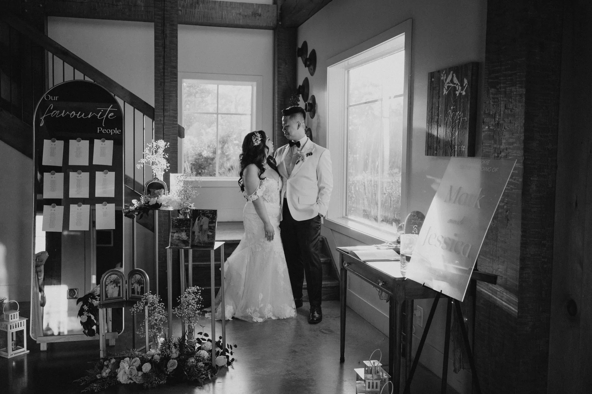 Hawthorne Estates barn reception interior with rustic timber beams and warm lighting, Manitoba
