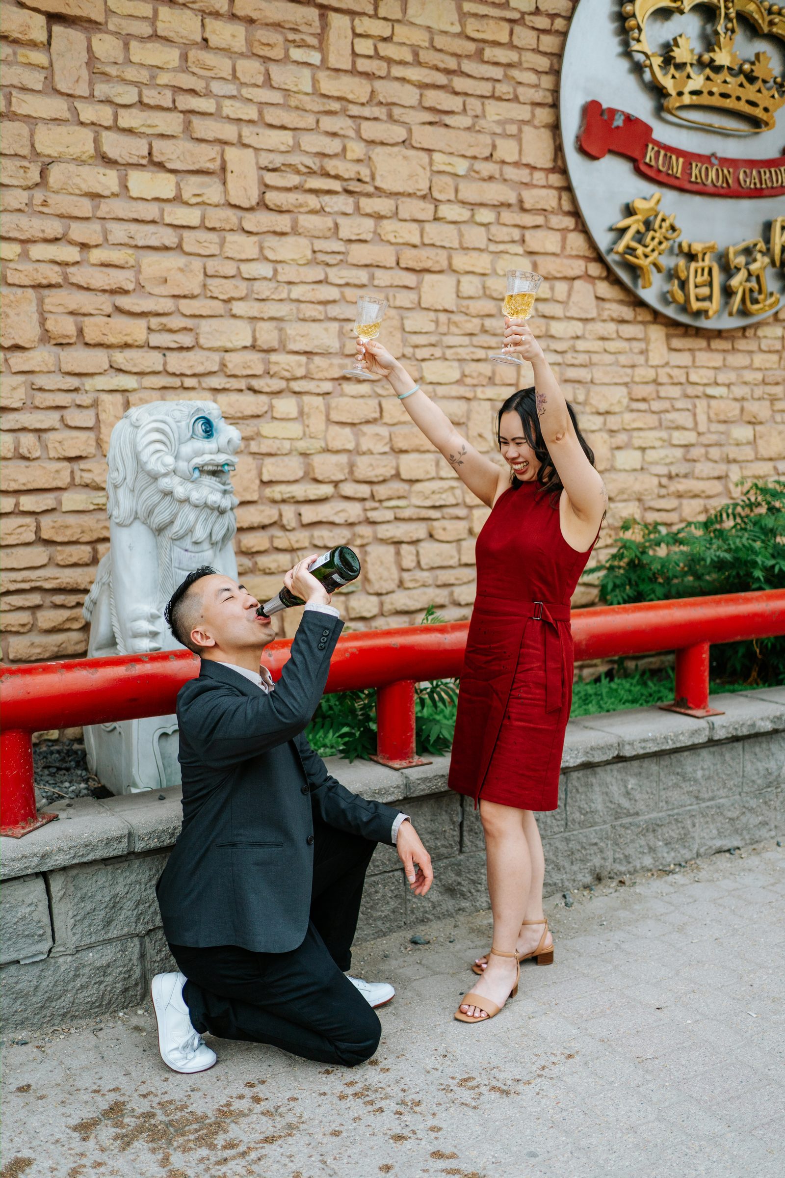 Monica and Jason final portrait outside Kum Koon Garden Winnipeg — engagement photography by Chris Ngo
