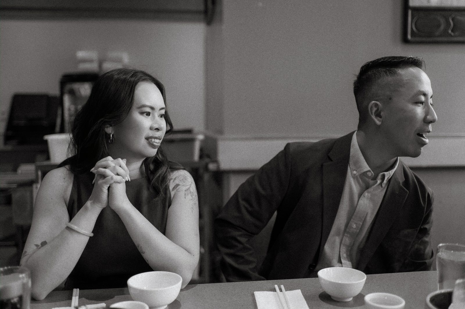 Monica and Jason inside Kum Koon Garden restaurant Winnipeg — Chinese heritage engagement photography by Chris Ngo, Ngo Photography