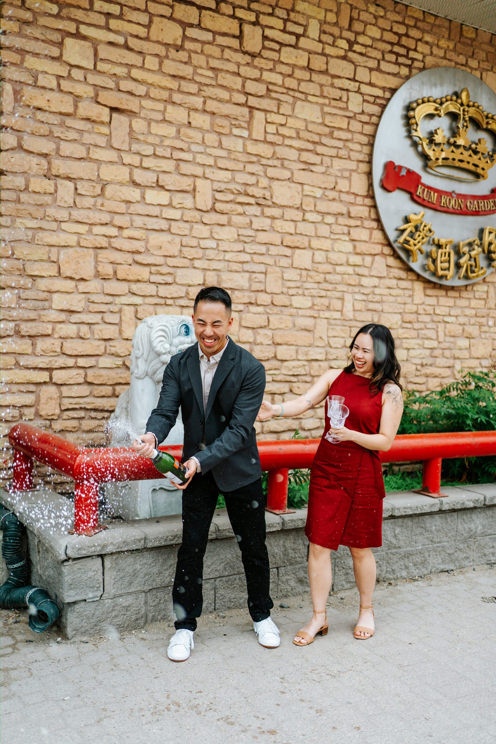 Monica and Jason close portrait inside Kum Koon Garden Winnipeg — Chinese Vietnamese engagement session by Chris Ngo