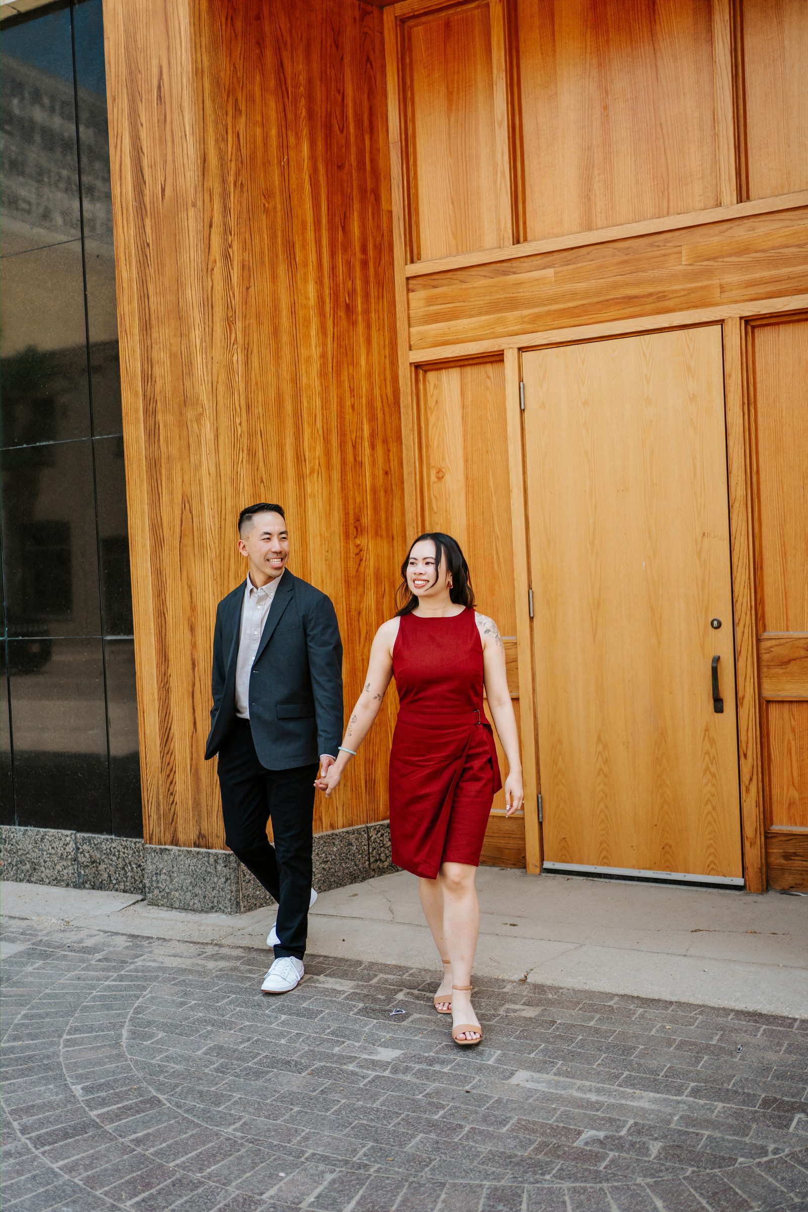 Monica and Jason candid moment in the Winnipeg studio — Chinese Vietnamese engagement photography by Chris Ngo
