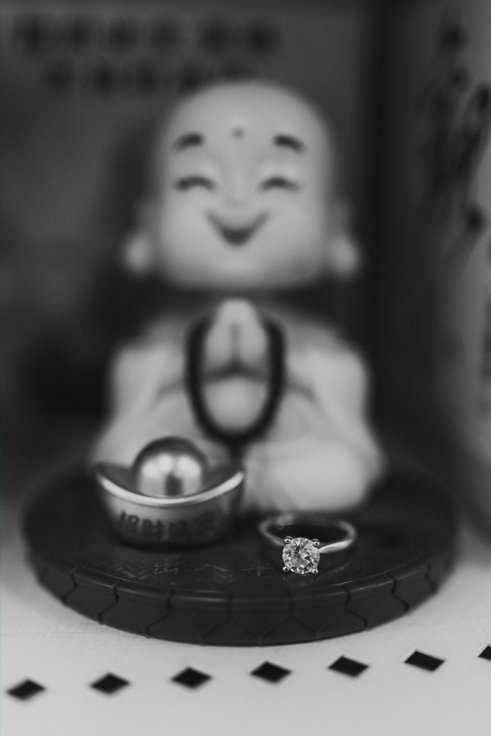 Monica and Jason laughing together in the Sun-Wah Centre grocery store in Chinatown Winnipeg — engagement photography by Ngo Photography