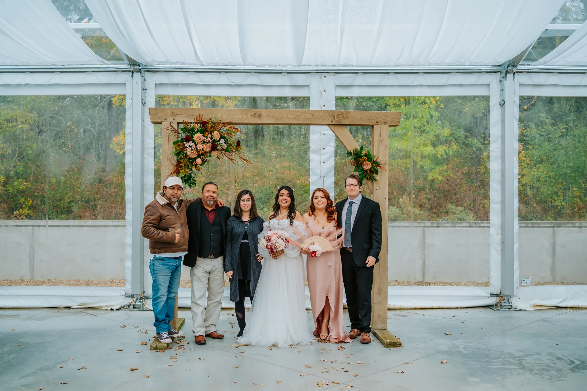 Paola and Riley laughing together in outdoor portrait at Oakland Estates Manitoba wedding — Ngo Photography Winnipeg