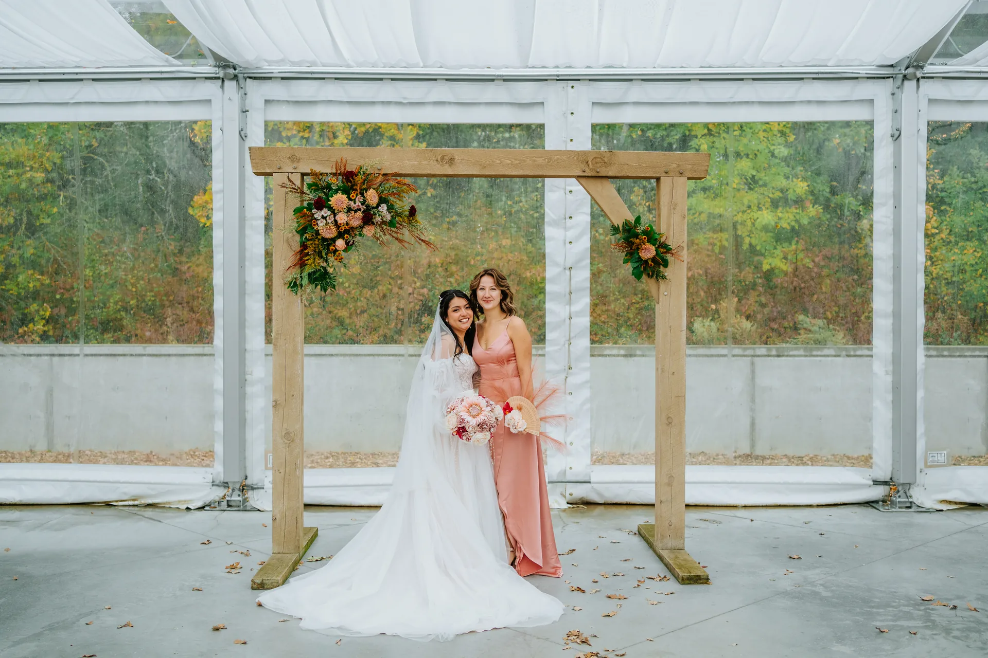 Paola and Riley full-length couple portrait in autumn foliage at Oakland Estates Manitoba — wedding photographer Chris Ngo