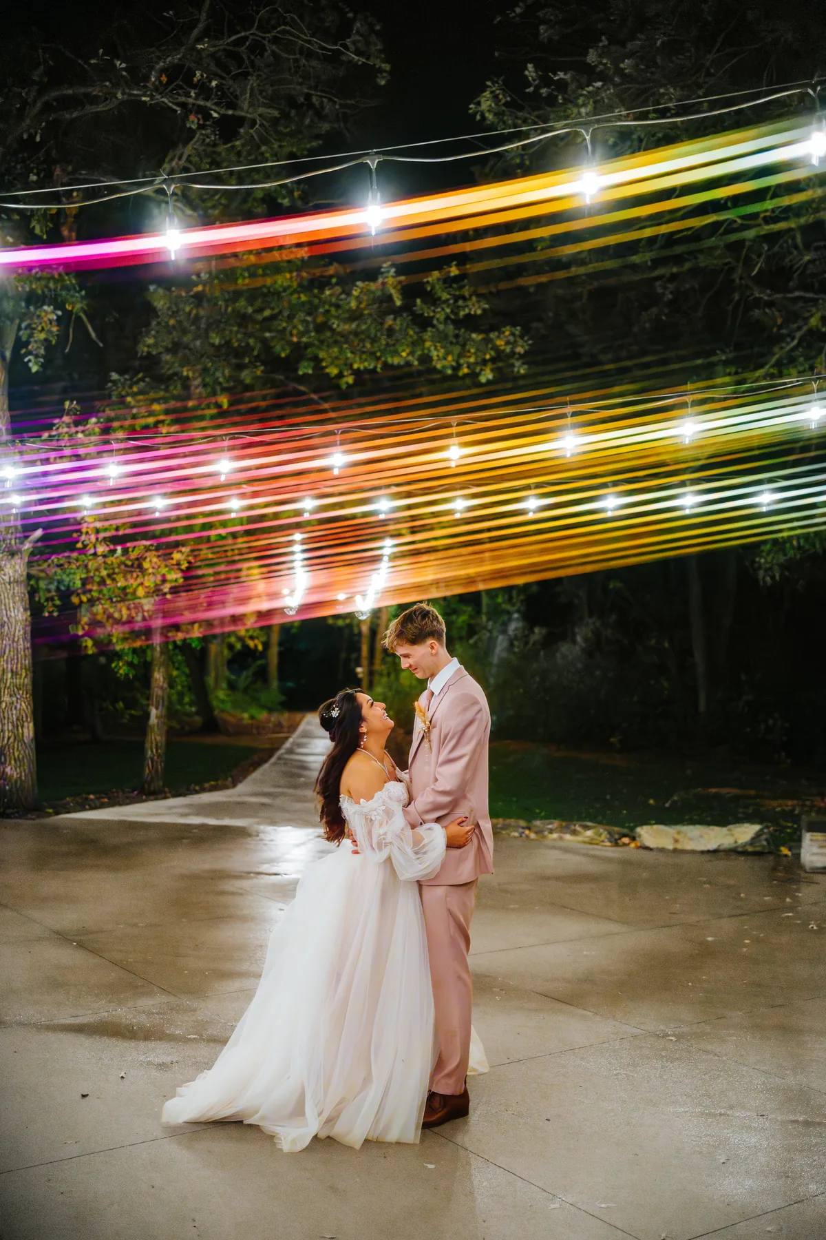Paola and Riley rainbow light painting night portrait at Oakland Estates Manitoba — wedding photography by Chris Ngo, Ngo Photography