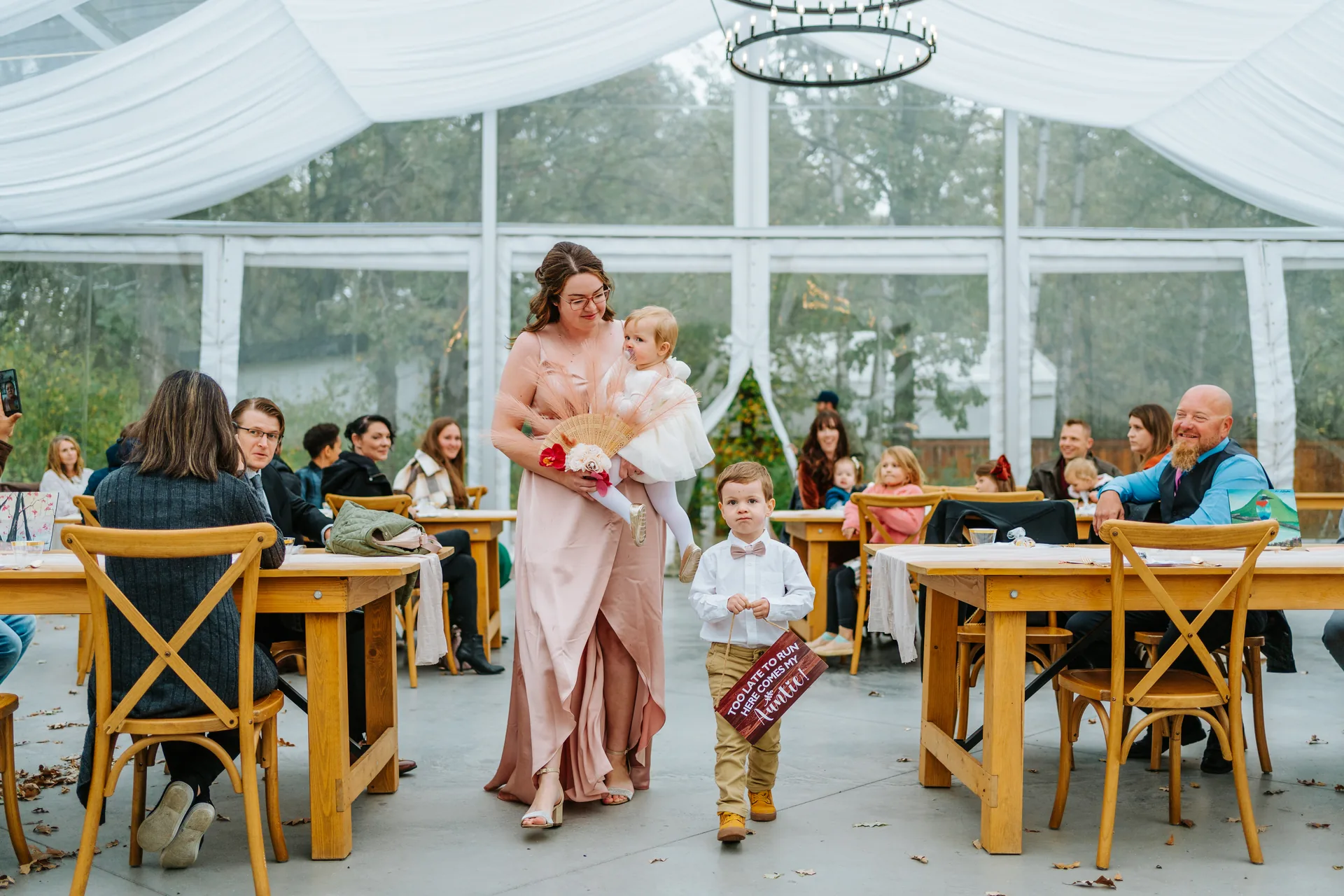 Groom Riley full-length solo portrait in blush suit at Oakland Estates Manitoba — wedding photographer Chris Ngo