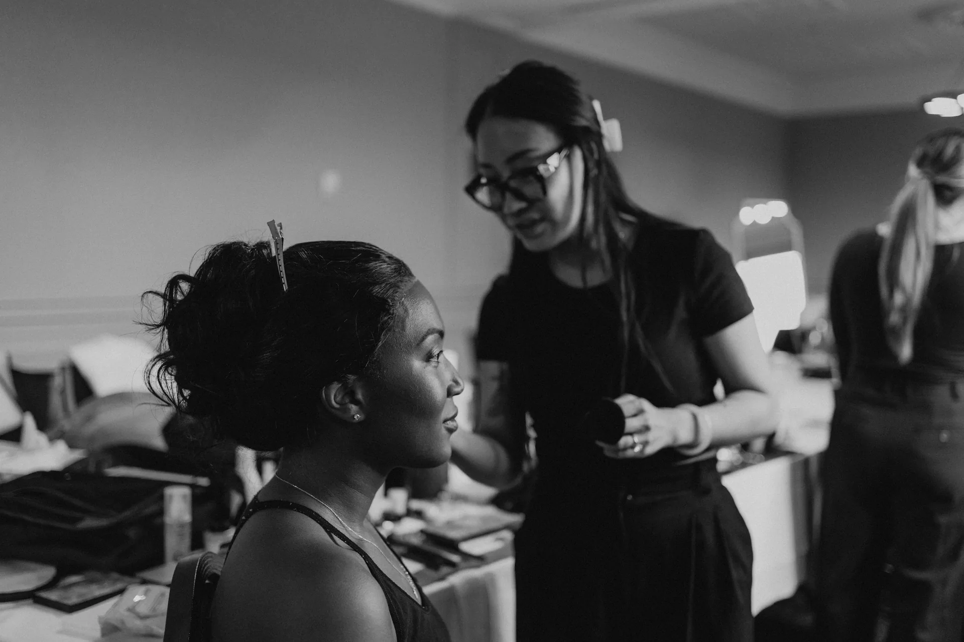 Bride in the makeup chair on the morning of her wedding at the Fort Garry Hotel, Winnipeg