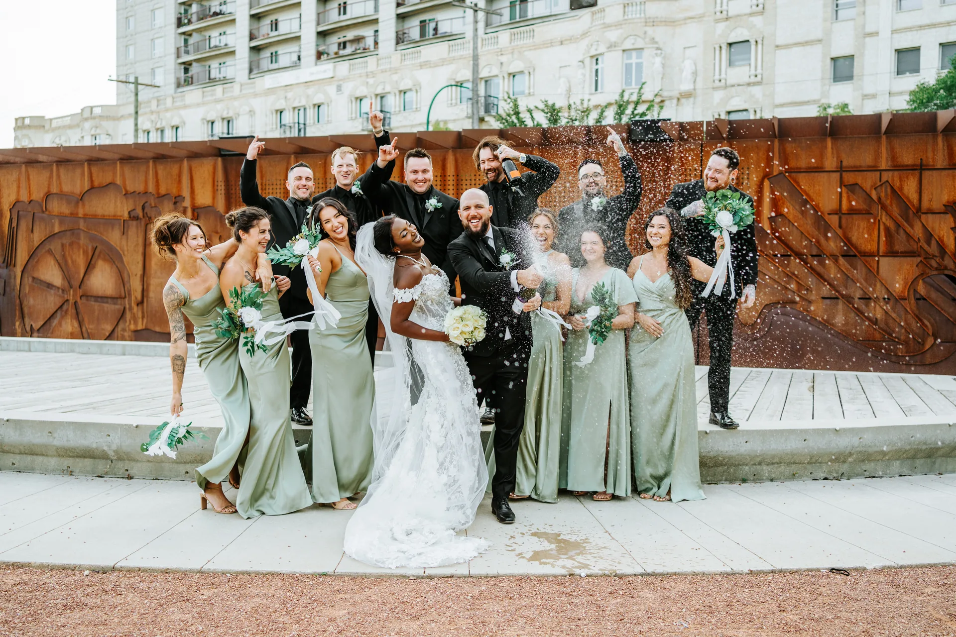 Outdoor wedding party portraits at The Forks, Winnipeg — Fort Garry Hotel wedding