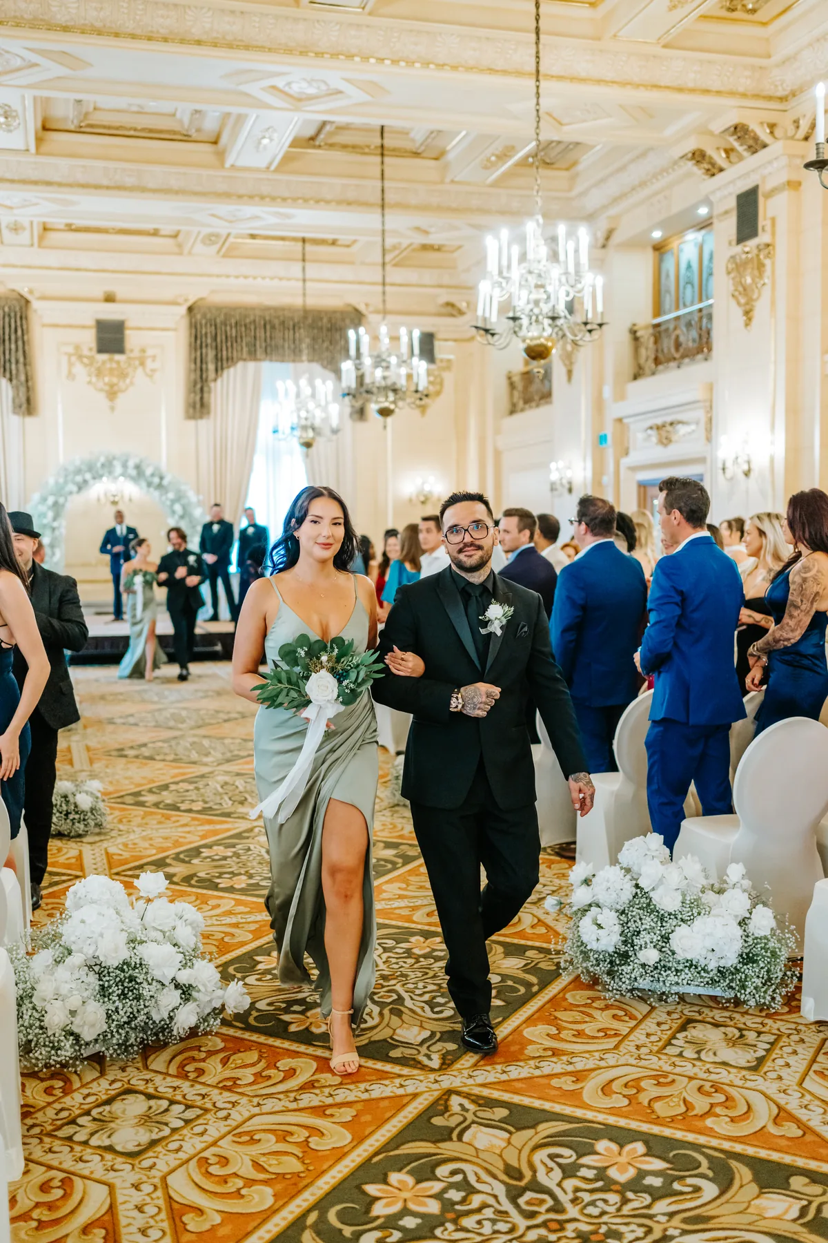Post-ceremony family moments in the Provencher Ballroom at the Fort Garry Hotel, Winnipeg