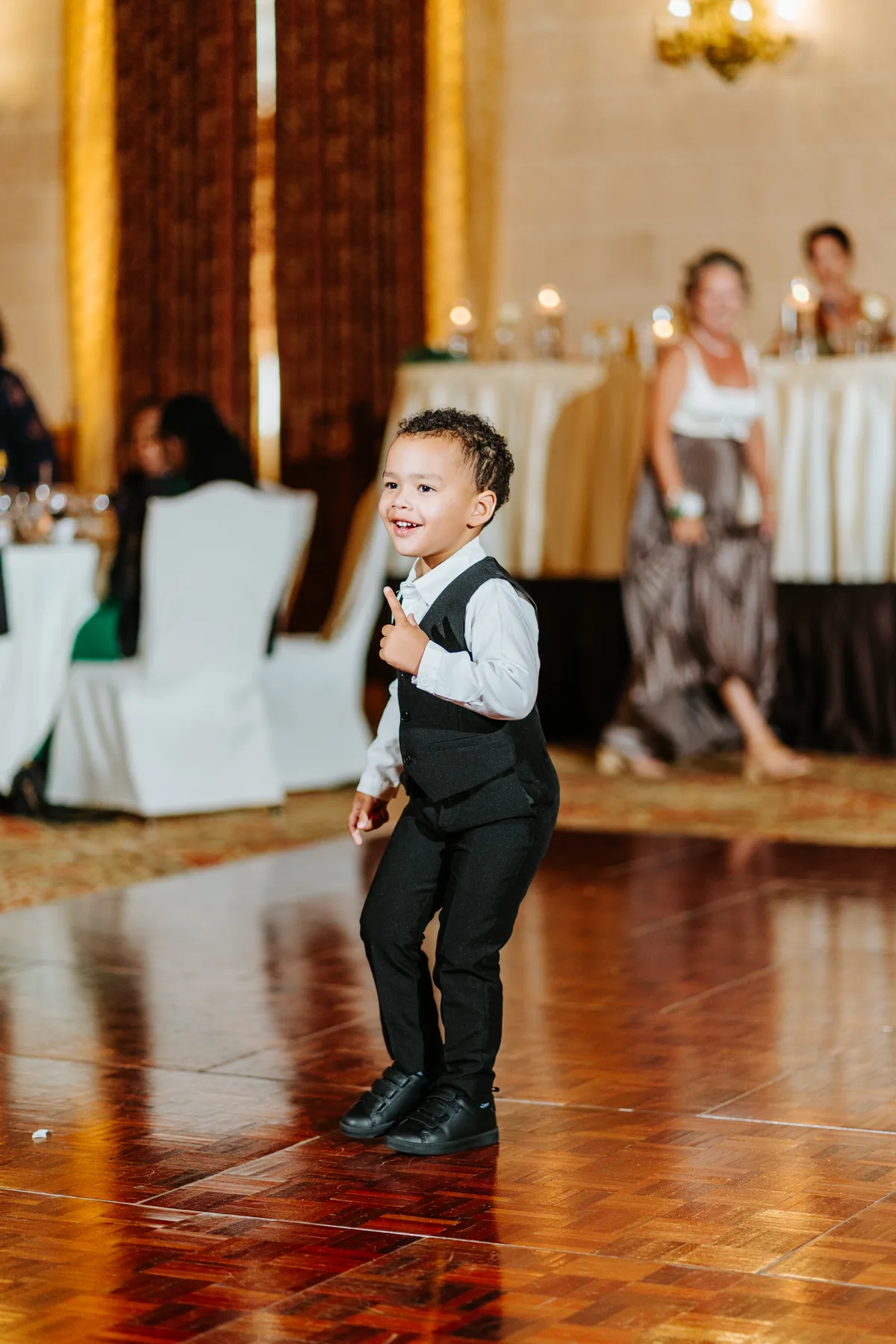 Ring bearer taking over the dance floor at the Fort Garry Hotel Provencher Ballroom, Winnipeg