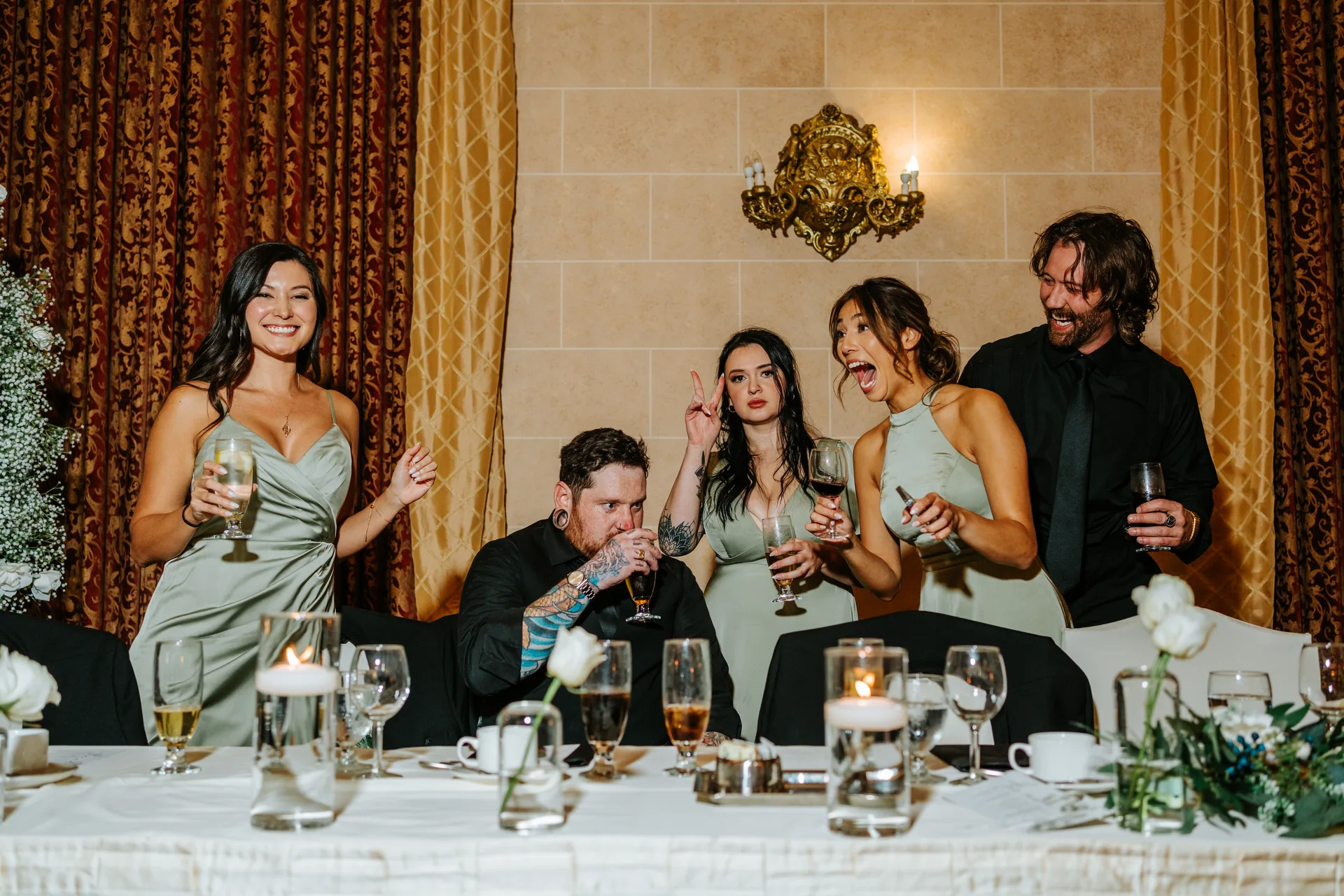 Full wedding party at the head table in the Provencher Ballroom at the Fort Garry Hotel, Winnipeg