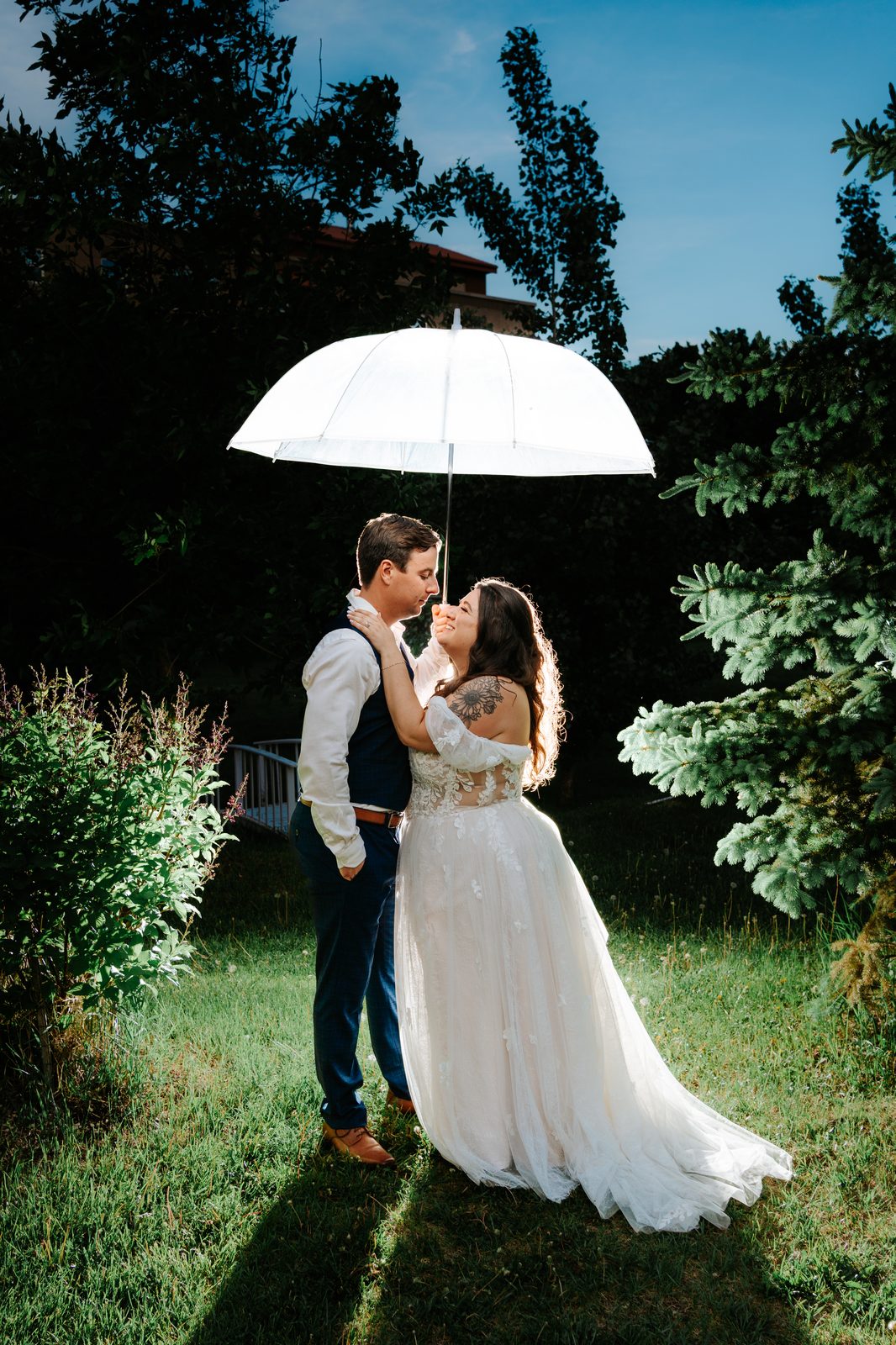 Stephanie and Drew outside in golden hour light at 8:54 PM — Caboto Centre Winnipeg wedding photography by Chris Ngo