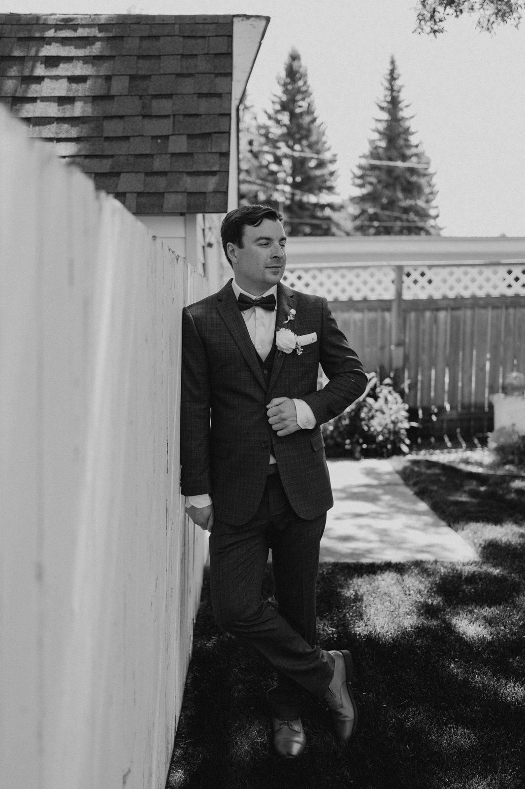 Drew in his navy three-piece suit, before the ceremony — Caboto Centre Winnipeg wedding by Chris Ngo