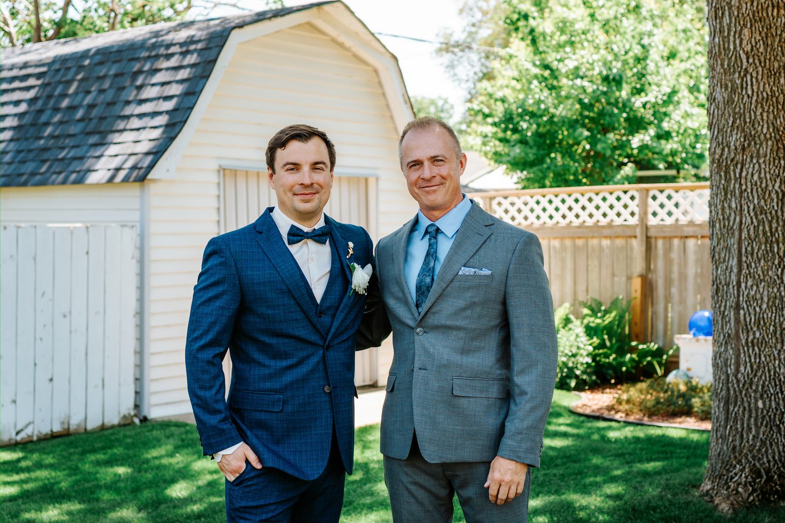Stephanie and Drew under a white umbrella in golden afternoon light — Caboto Centre wedding portraits by Chris Ngo
