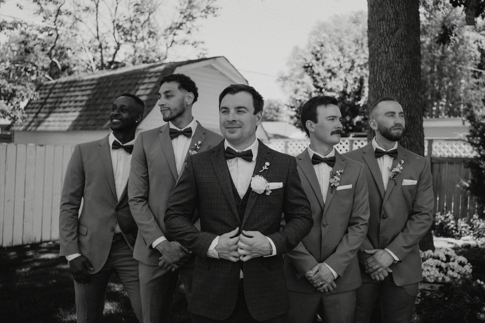 Stephanie and Drew in the sunny backyard — Caboto Centre Winnipeg wedding portraits by Chris Ngo